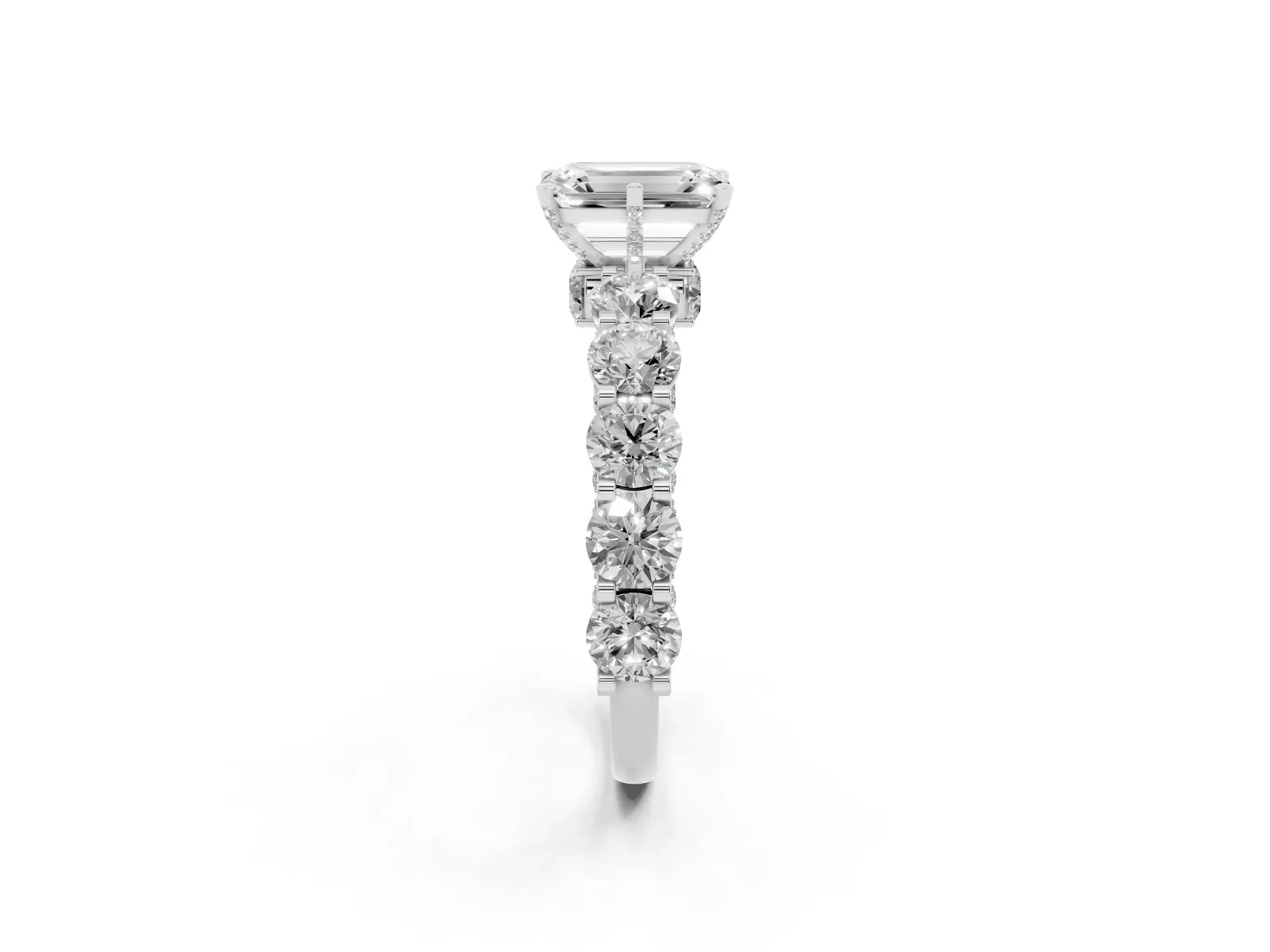Emerald Cut Diamond Side Stone Engagement Ring with Four-Prong Setting Platinum