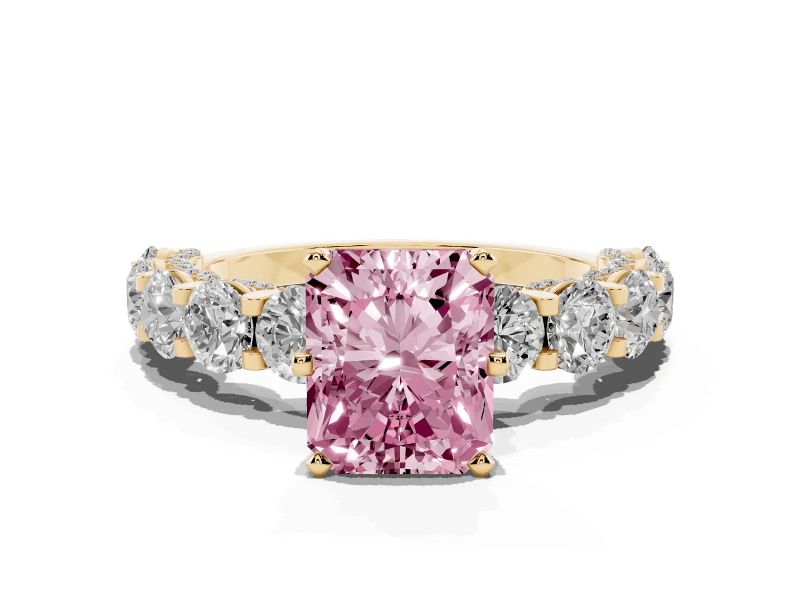 Fancy Pink Radiant Cut Diamond Side Stone Engagement Ring with Four-Prong Setting Yellow gold