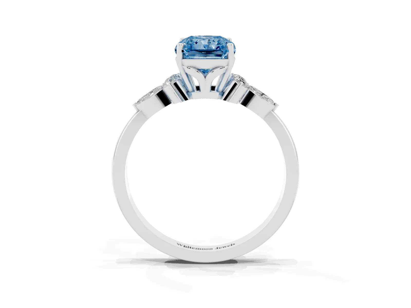 Fancy Blue Radiant Cut Brilliant Diamond Solitaire Ring with Pear Side Stones and Four-Prong Setting White gold
