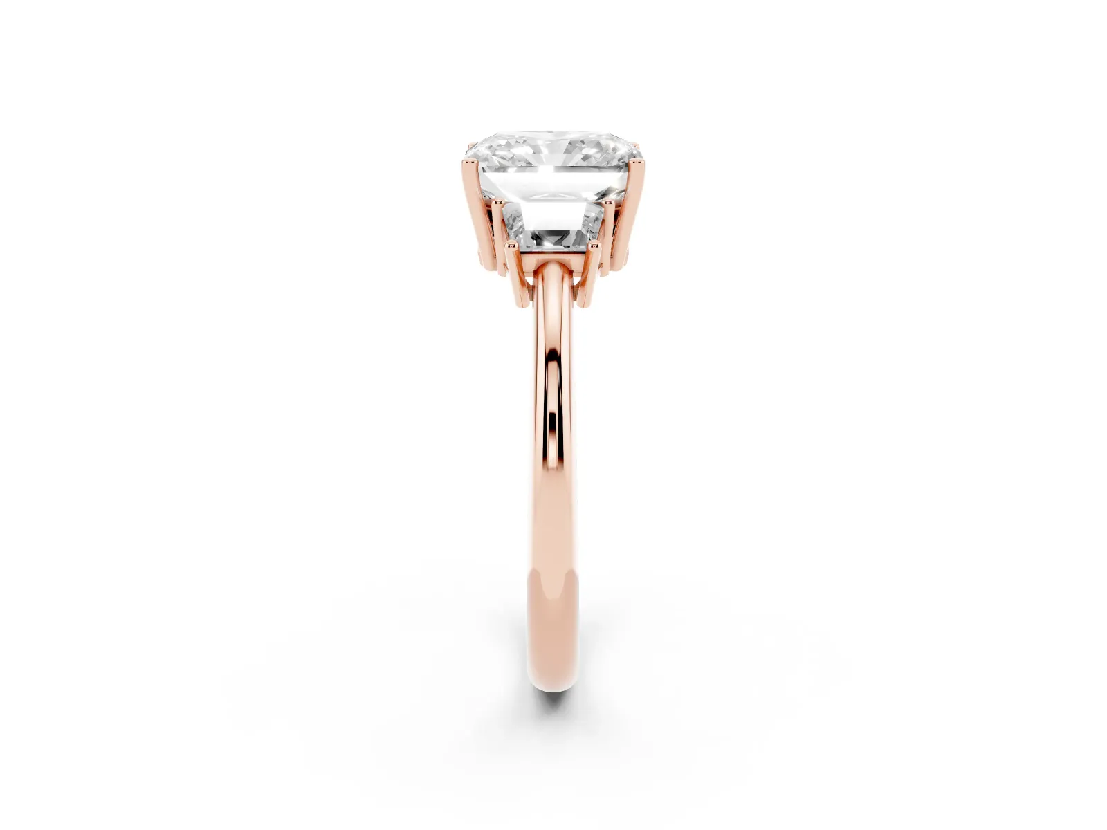 Radiant Cut Diamond Three-Stone Ring with Trapezoid Side Stones and Prong Setting Rose gold