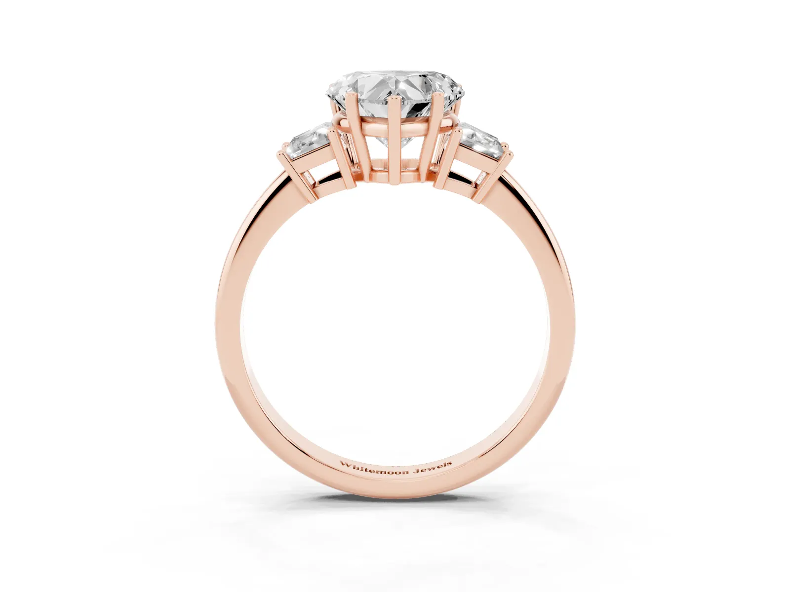 Heart Cut Diamond Three-Stone Ring with Trapezoid Side Stones and Prong Setting Rose gold