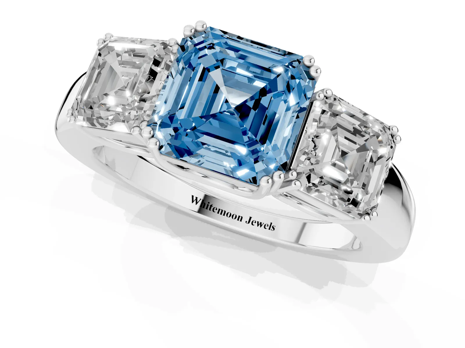 Fancy Blue Three-Stone Asscher Cut Cut Diamond Ring with Channel Set Band and Four-Prong Setting White gold