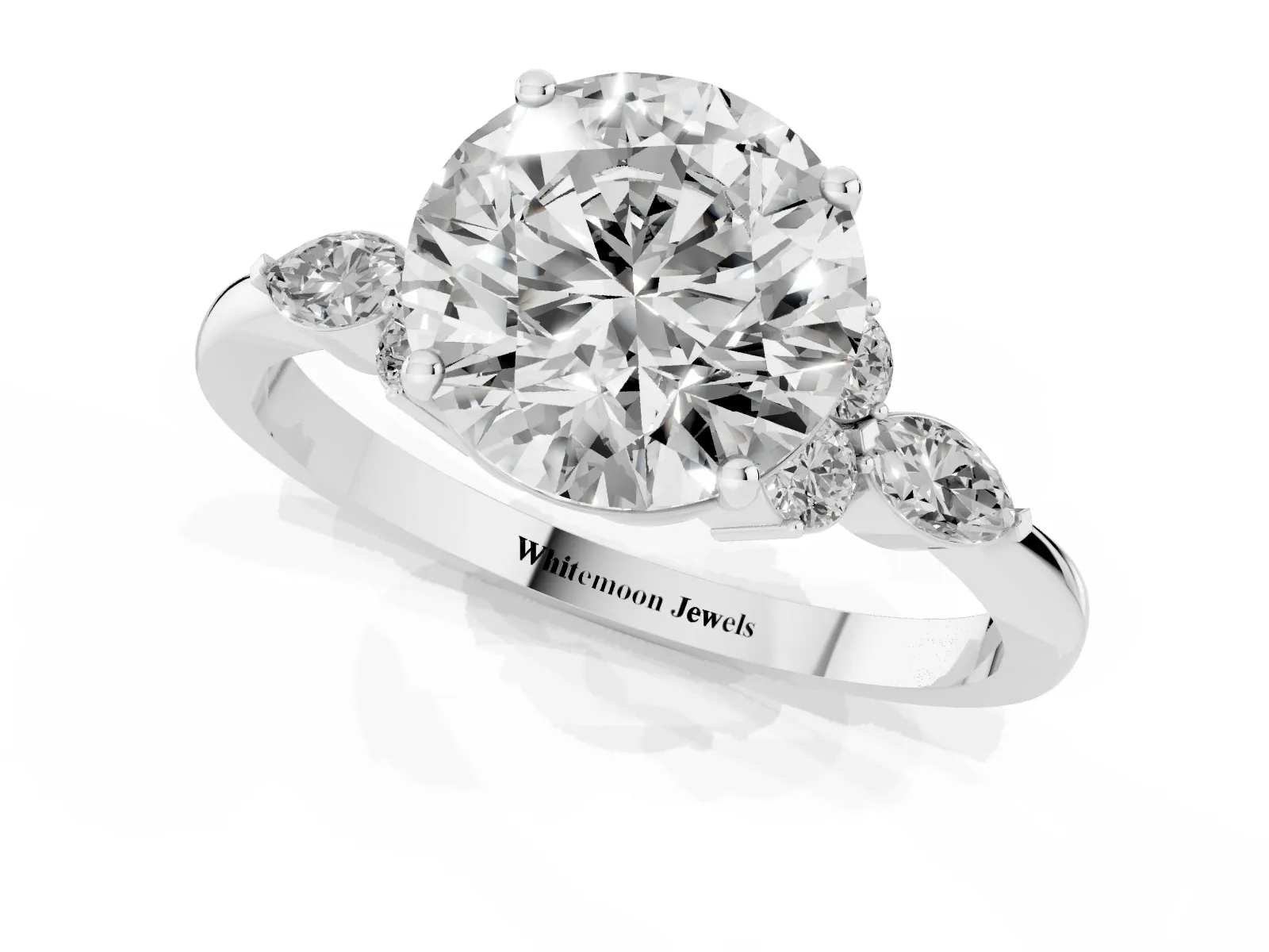 Round Cut Brilliant Diamond Solitaire Ring with Pear Side Stones and Four-Prong Setting Platinum