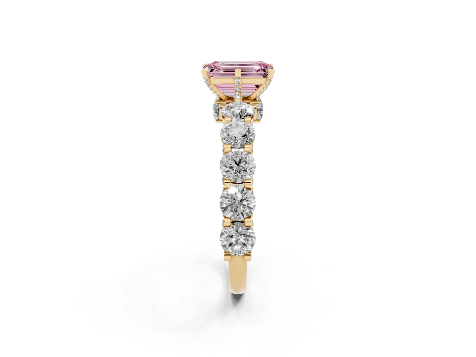 Fancy Pink Emerald Cut Diamond Side Stone Engagement Ring with Four-Prong Setting Yellow gold