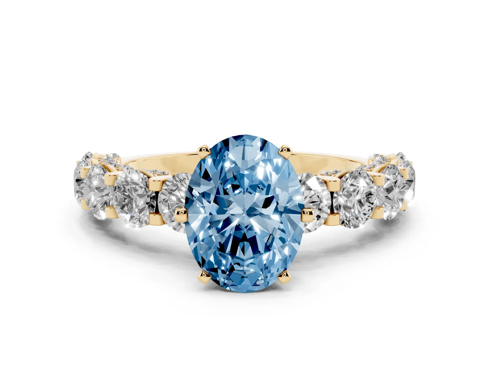 Fancy Blue Oval Cut Diamond Side Stone Engagement Ring with Four-Prong Setting Yellow gold