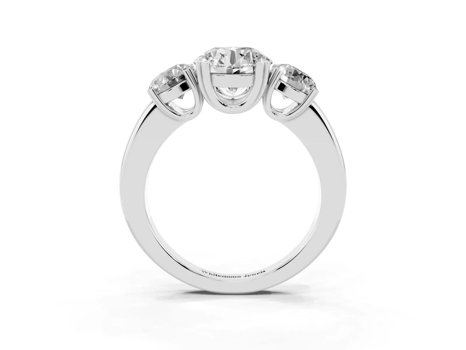 Three-Stone Round Cut Cut Diamond Ring with Channel Set Band and Four-Prong Setting White gold