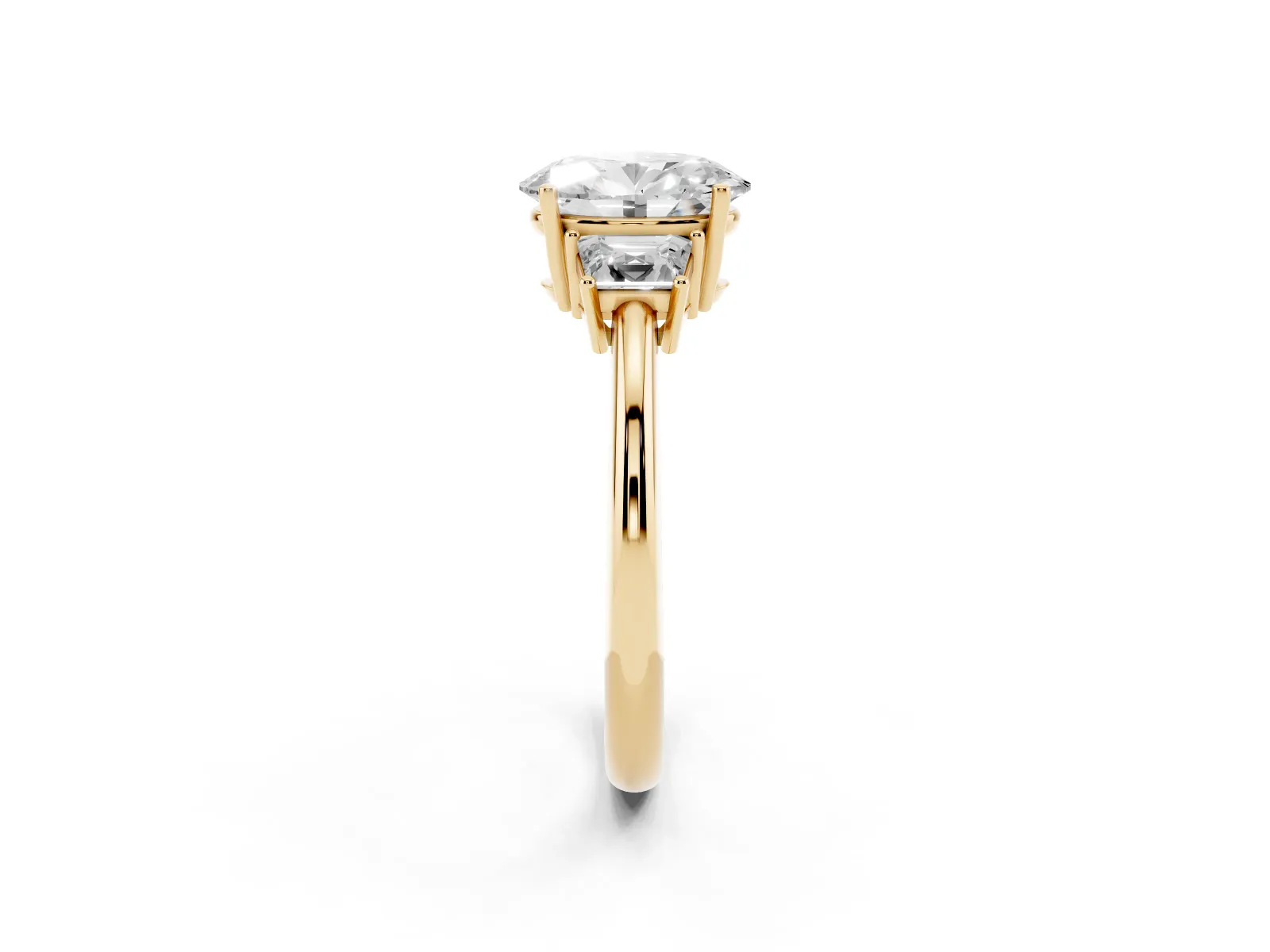 Oval Cut Diamond Three-Stone Ring with Trapezoid Side Stones and Prong Setting Yellow gold