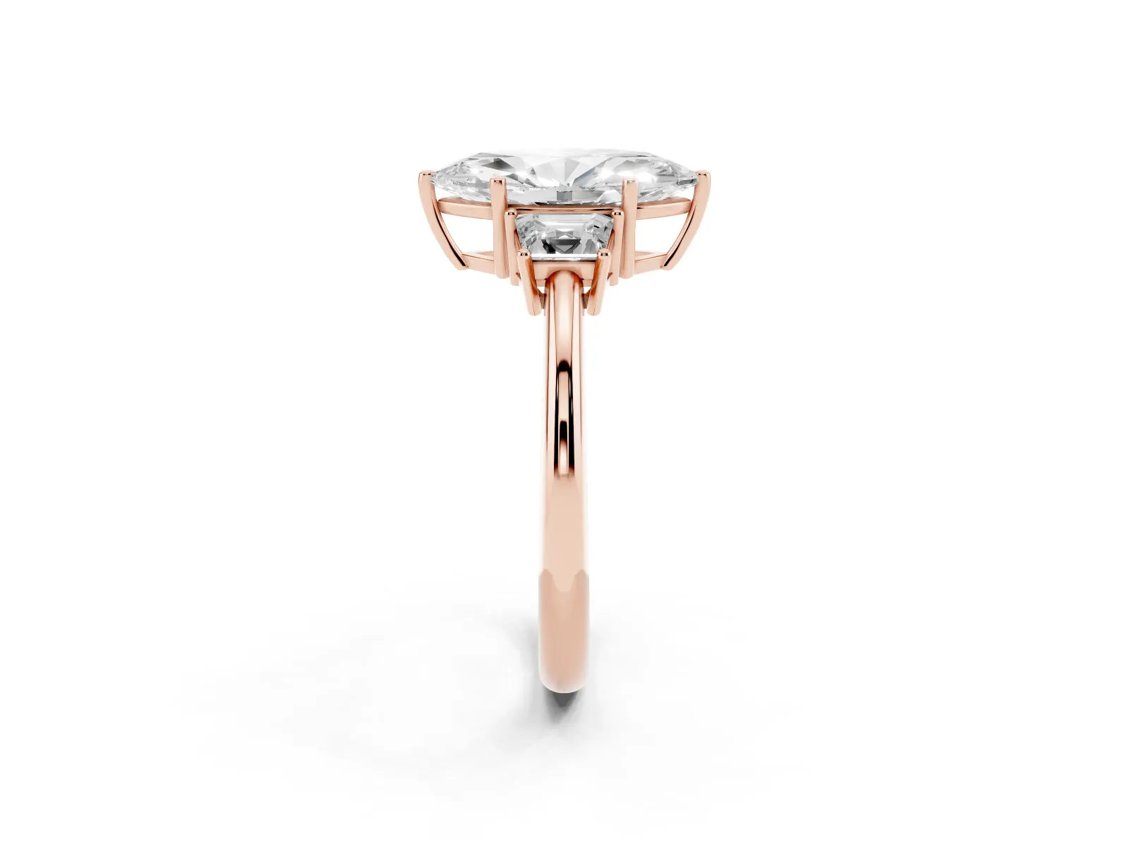 Marquise Cut Diamond Three-Stone Ring with Trapezoid Side Stones and Prong Setting Rose gold