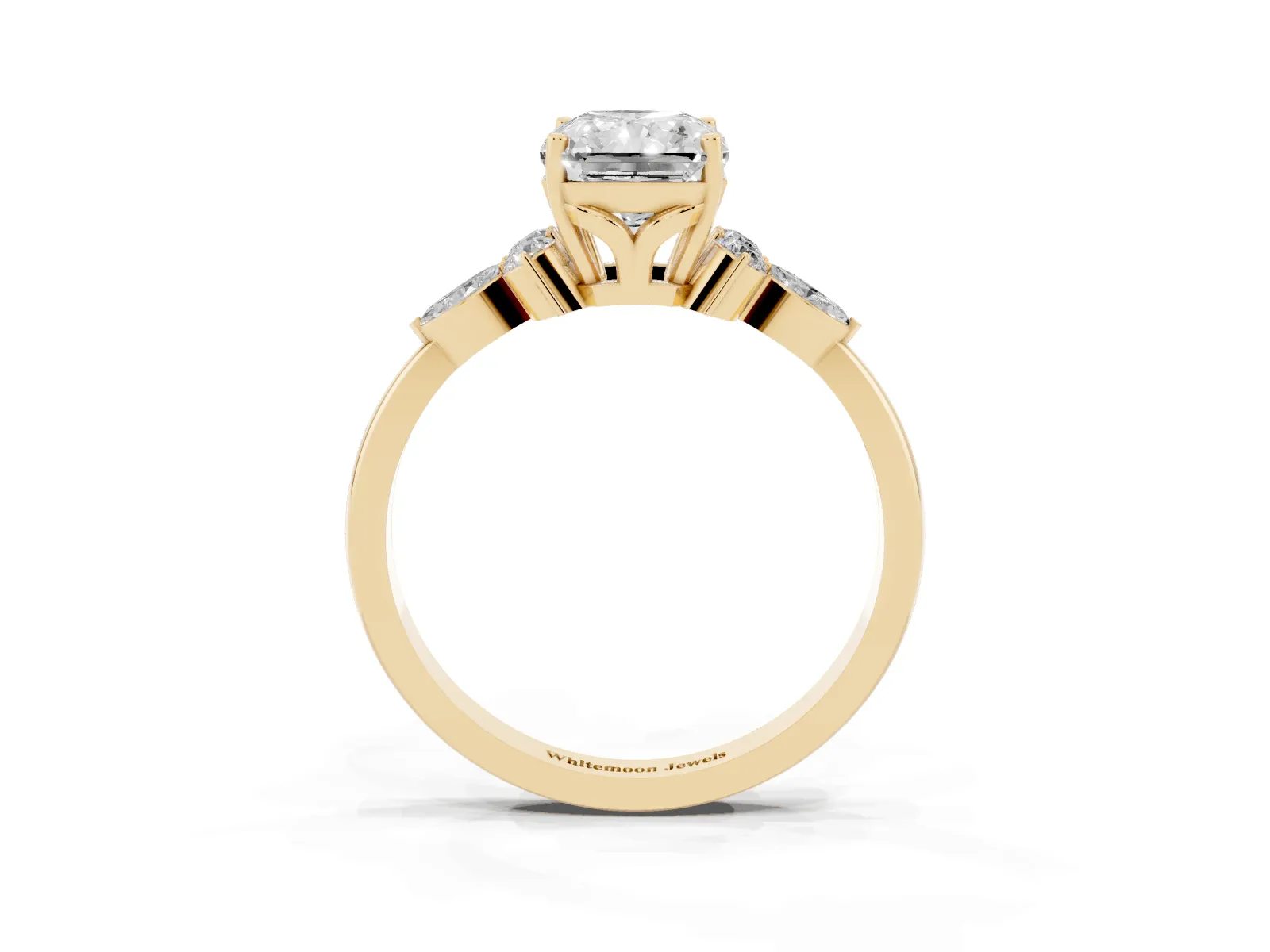 Radiant Cut Brilliant Diamond Solitaire Ring with Pear Side Stones and Four-Prong Setting Yellow gold