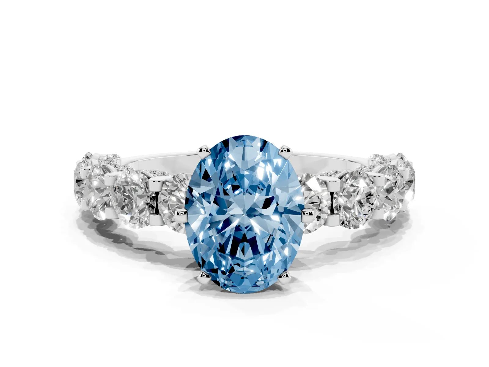 Fancy Blue Oval Cut Diamond Side Stone Engagement Ring with Four-Prong Setting White gold