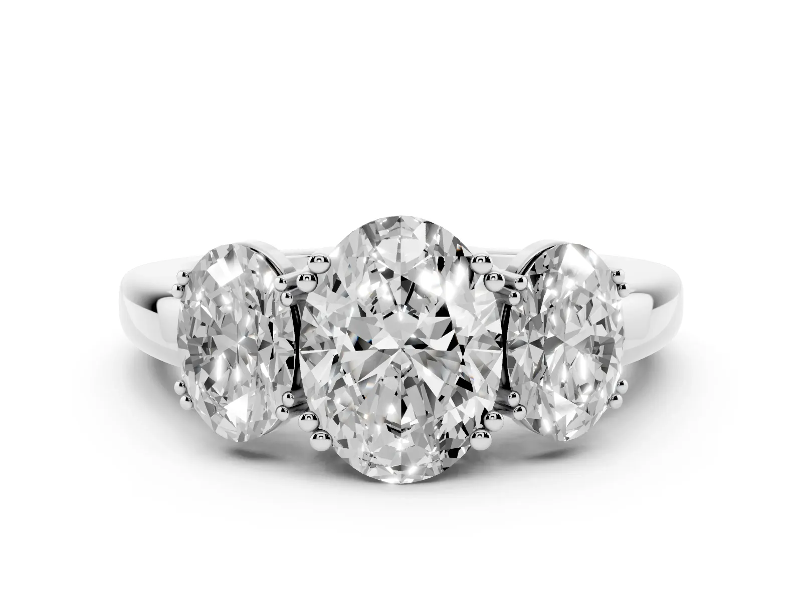 Three-Stone Oval Cut Cut Diamond Ring with Channel Set Band and Four-Prong Setting White gold