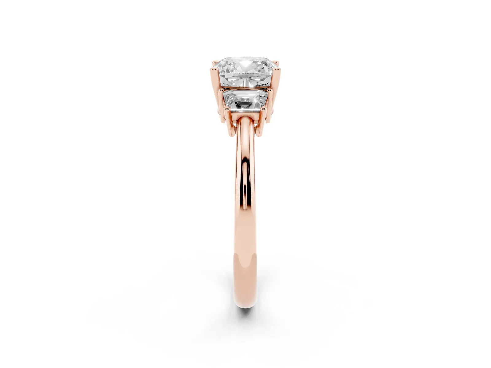 Cushion Cut Diamond Three-Stone Ring with Trapezoid Side Stones and Prong Setting Rose gold