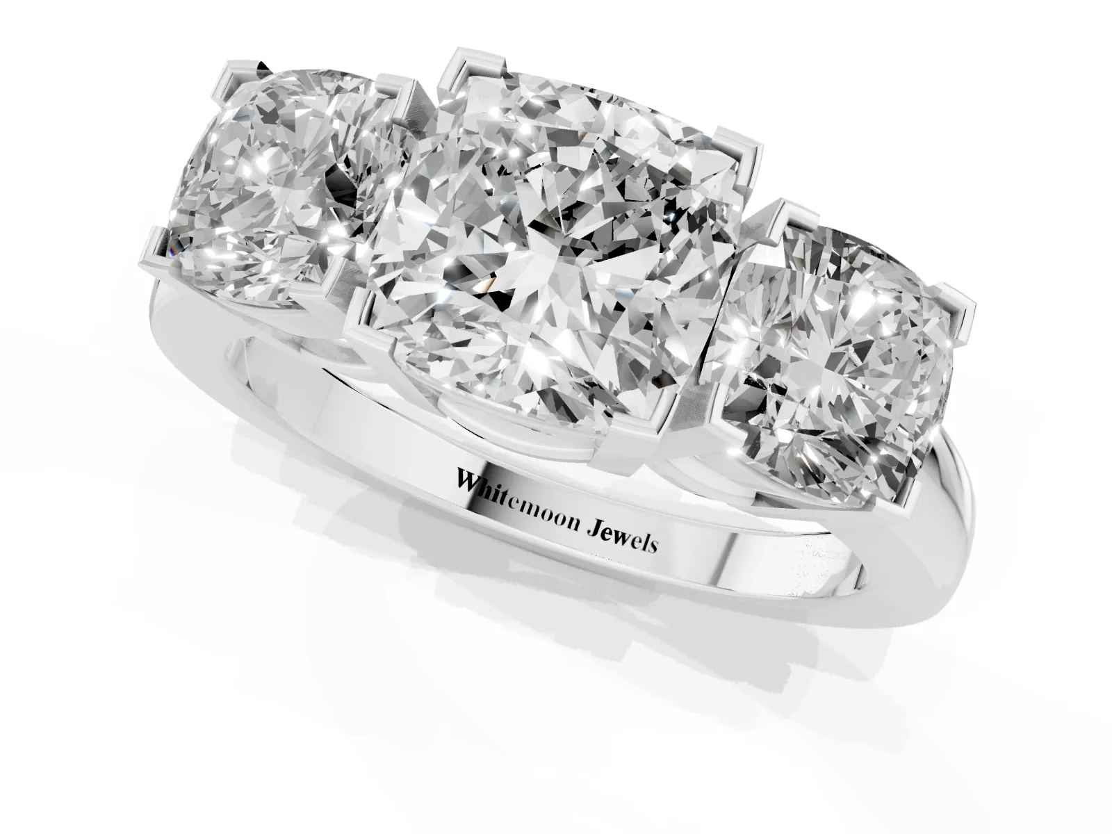 Three-Stone Cushion Cut Cut Diamond Ring with Channel Set Band and Four-Prong Setting Platinum