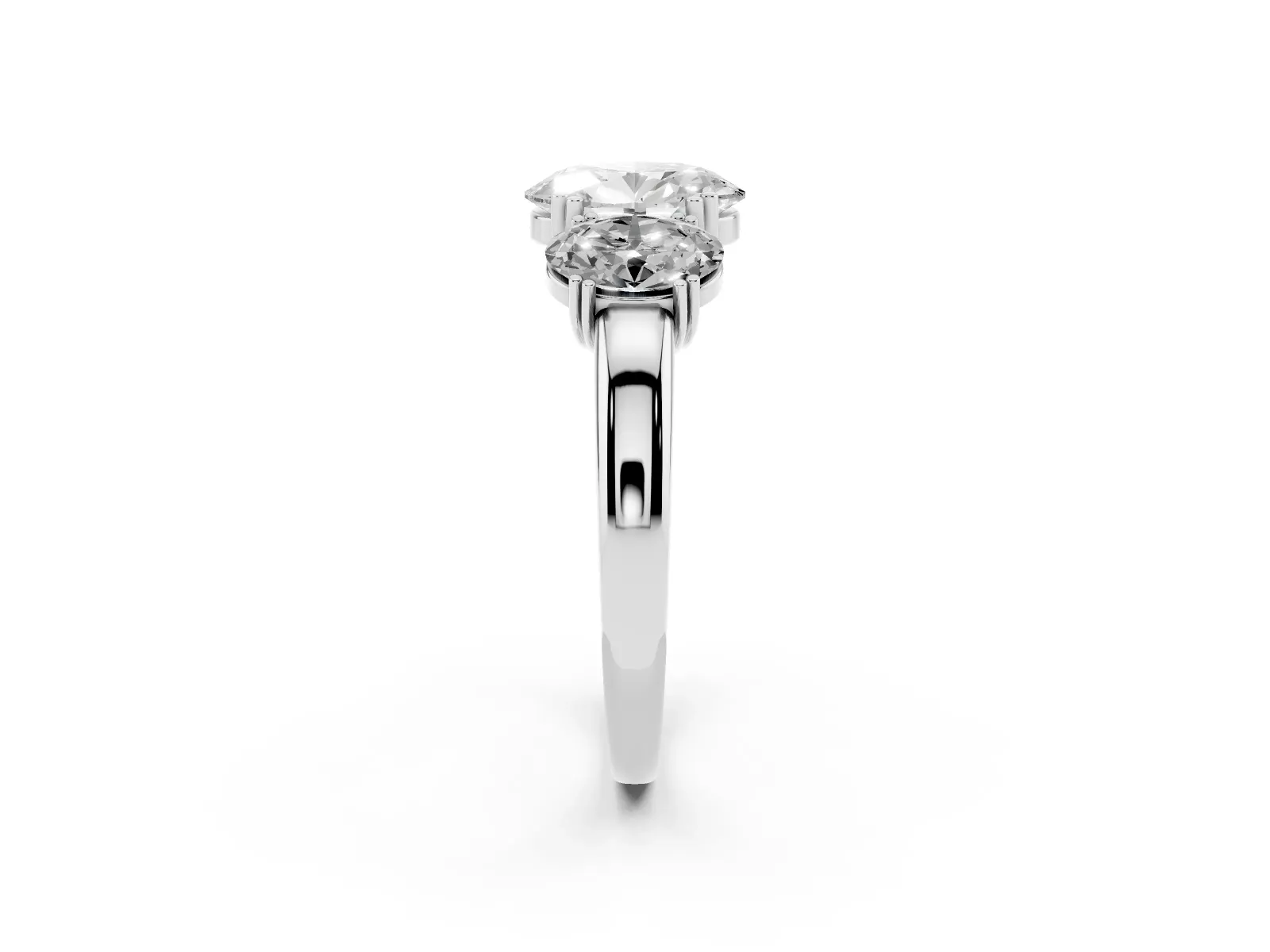 Three-Stone Oval Cut Cut Diamond Ring with Channel Set Band and Four-Prong Setting White gold