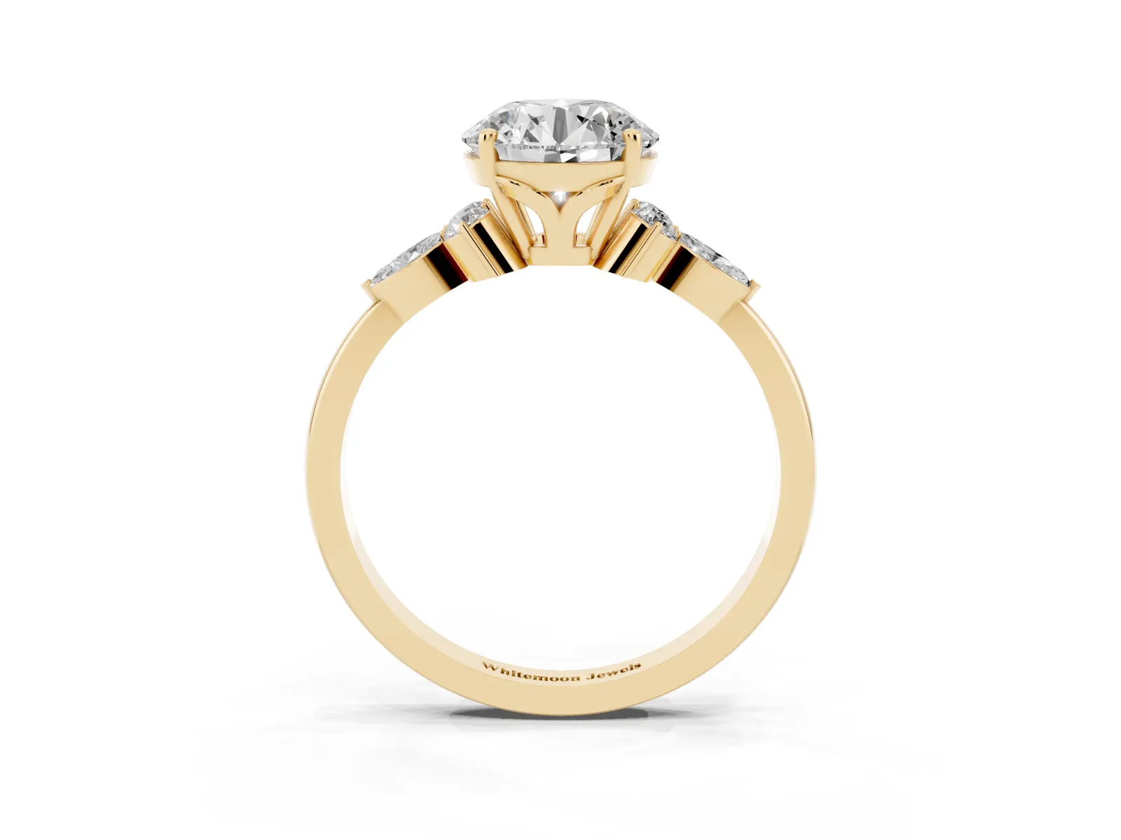 Round Cut Brilliant Diamond Solitaire Ring with Pear Side Stones and Four-Prong Setting Yellow gold