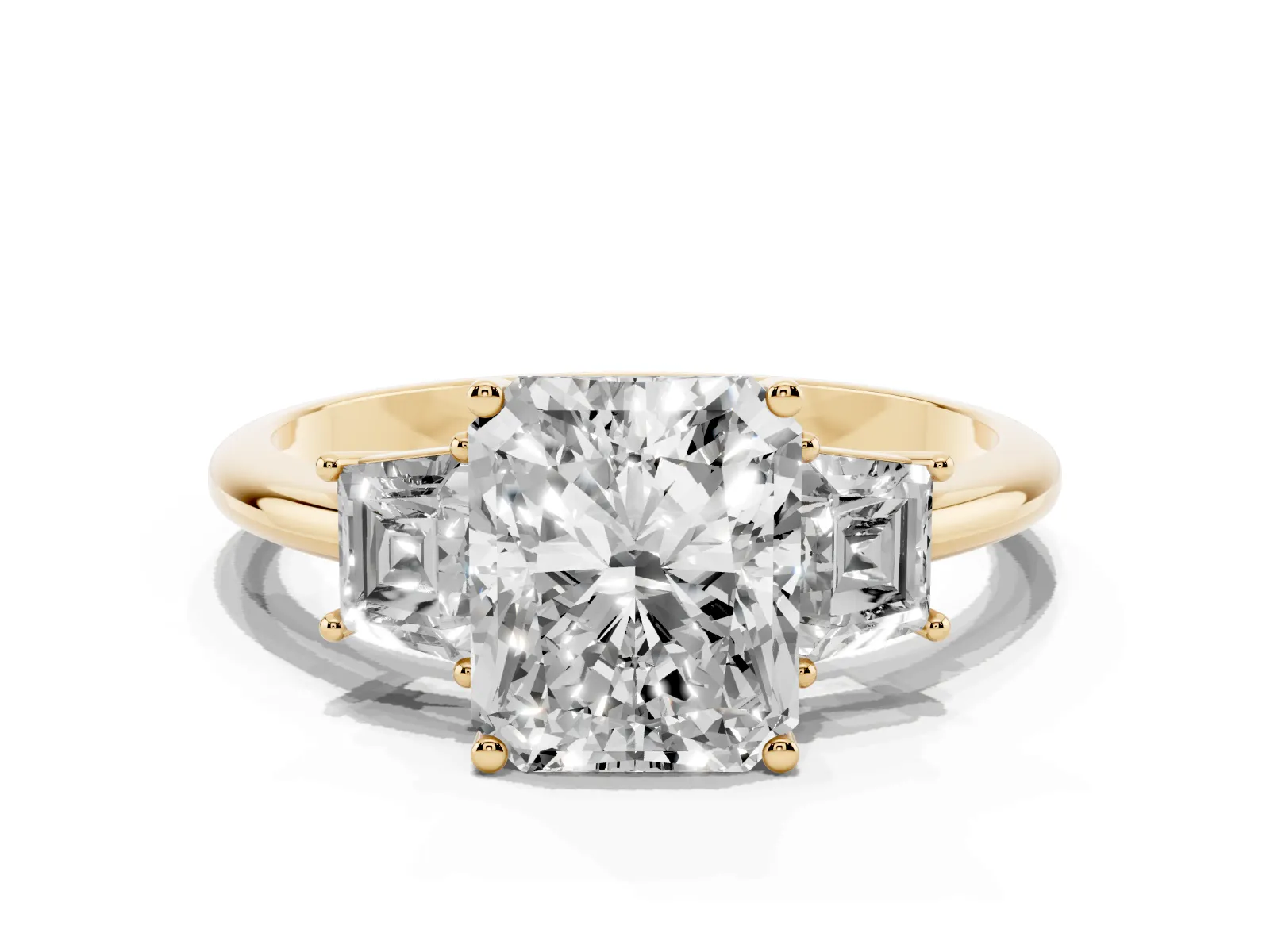 Radiant Cut Diamond Three-Stone Ring with Trapezoid Side Stones and Prong Setting Yellow gold