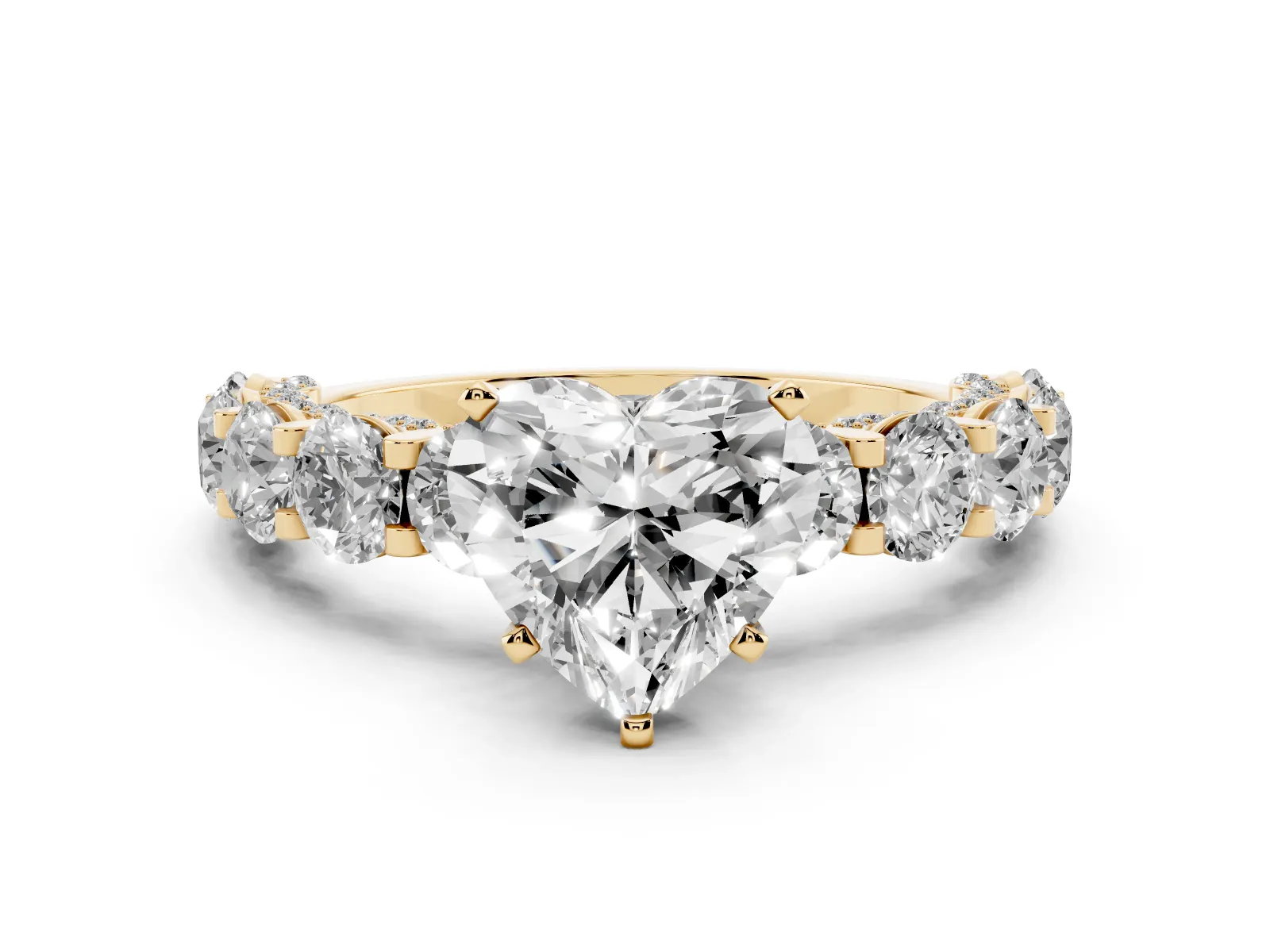 Heart Cut Diamond Side Stone Engagement Ring with Four-Prong Setting Yellow gold