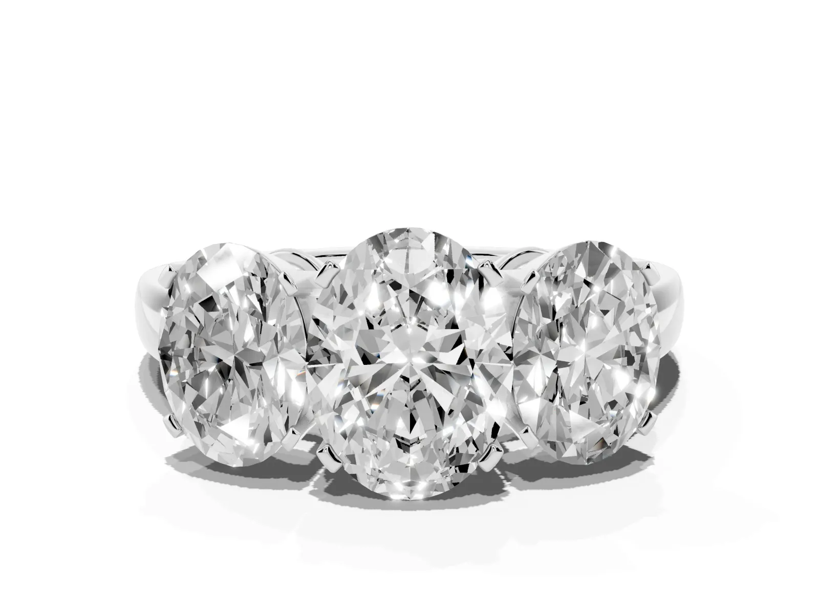Three-Stone Oval Cut Cut Diamond Ring with Channel Set Band and Four-Prong Setting Platinum