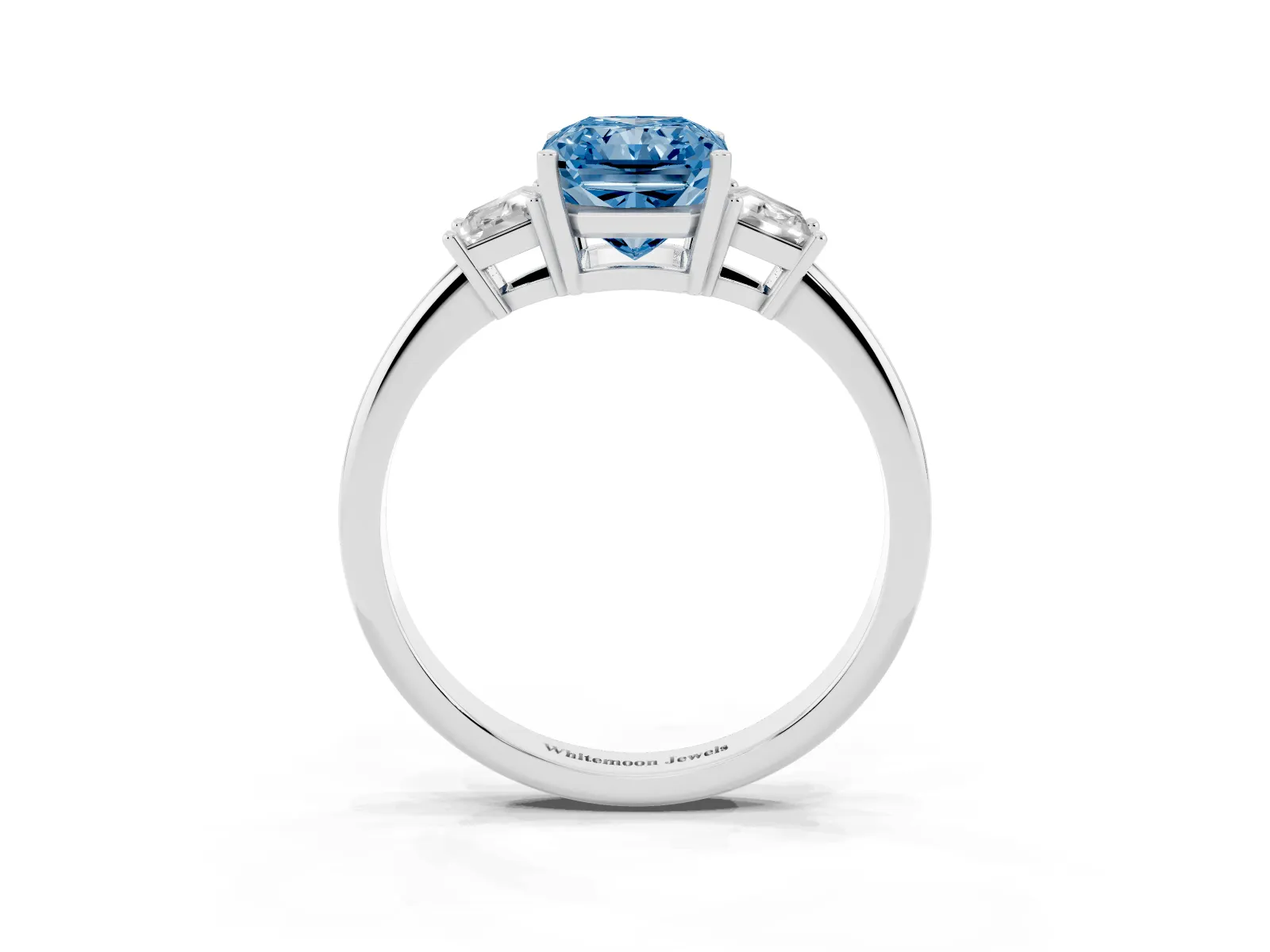 Fancy Blue Radiant Cut Diamond Three-Stone Ring with Trapezoid Side Stones and Prong Setting Platinum