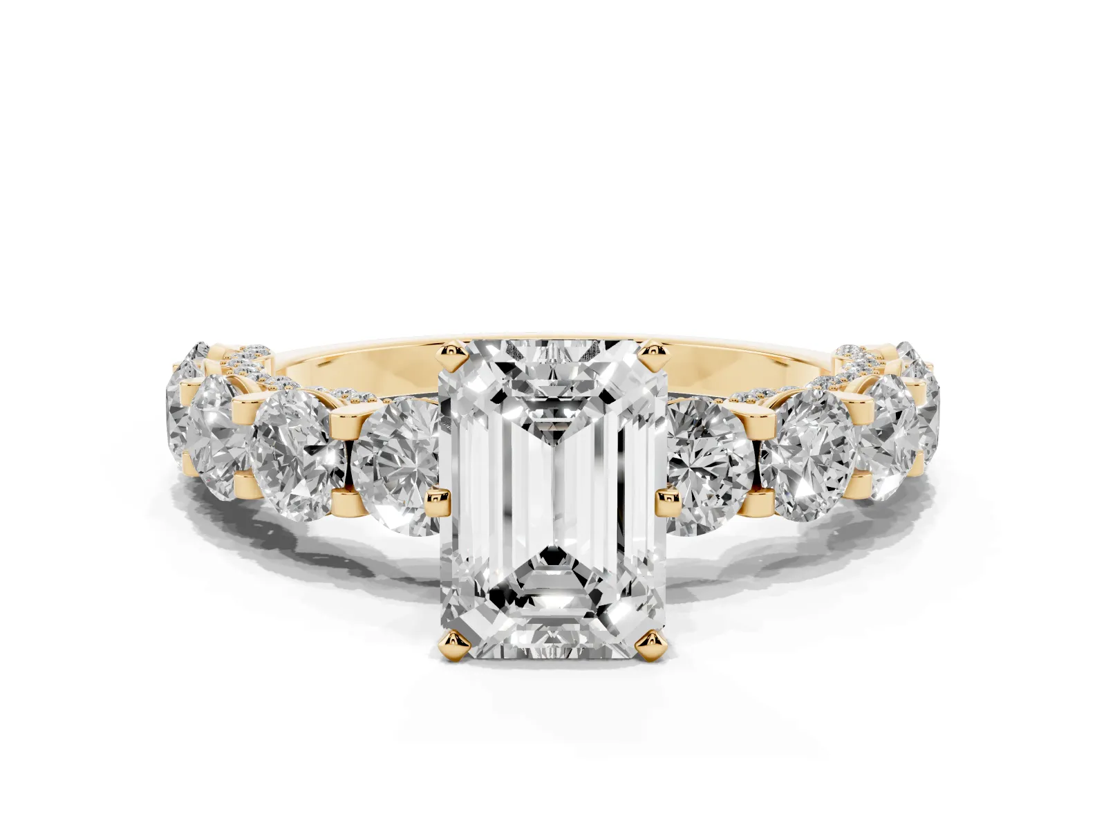 Emerald Cut Diamond Side Stone Engagement Ring with Four-Prong Setting Yellow gold