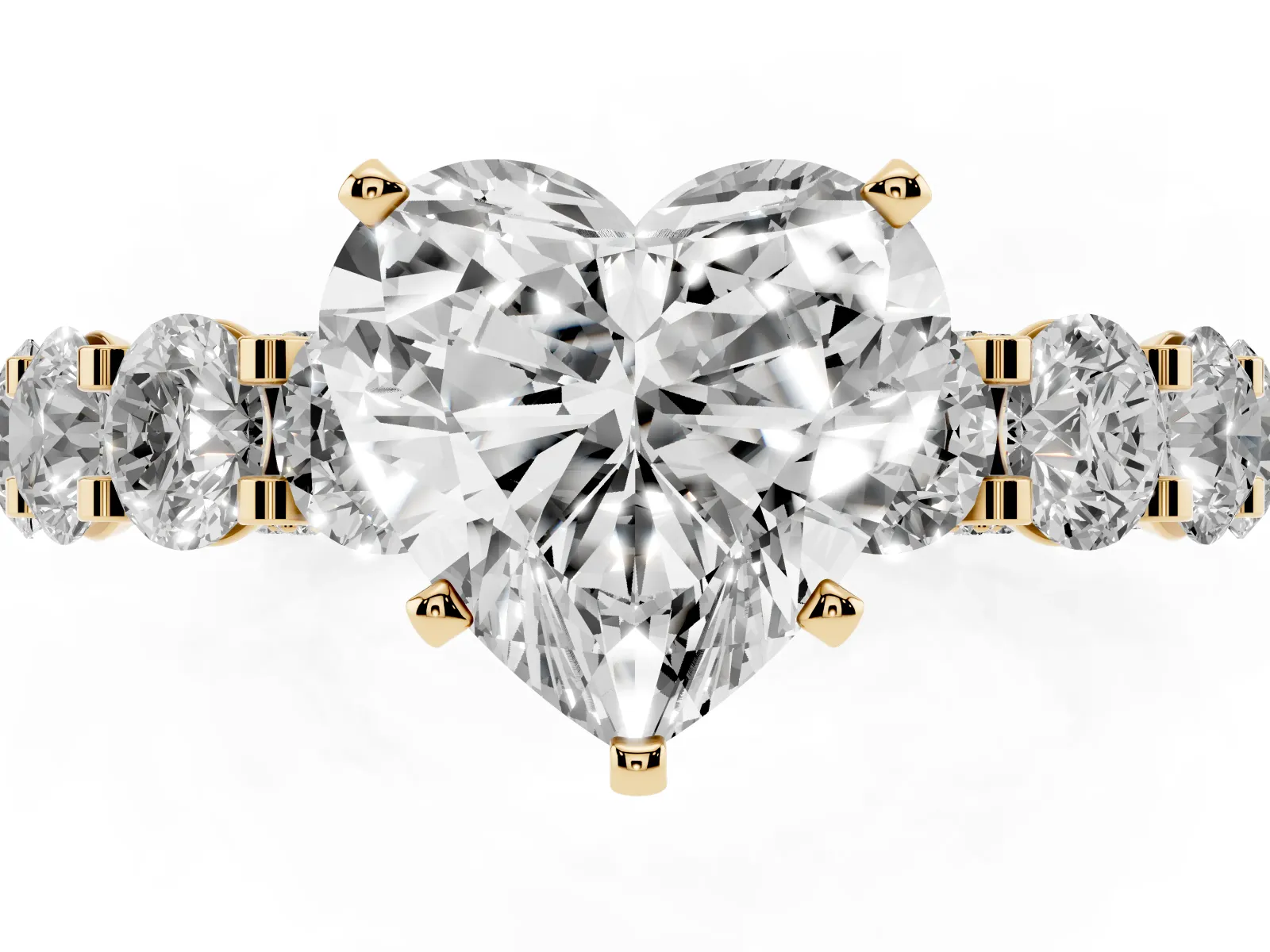 Heart Cut Diamond Side Stone Engagement Ring with Four-Prong Setting Yellow gold