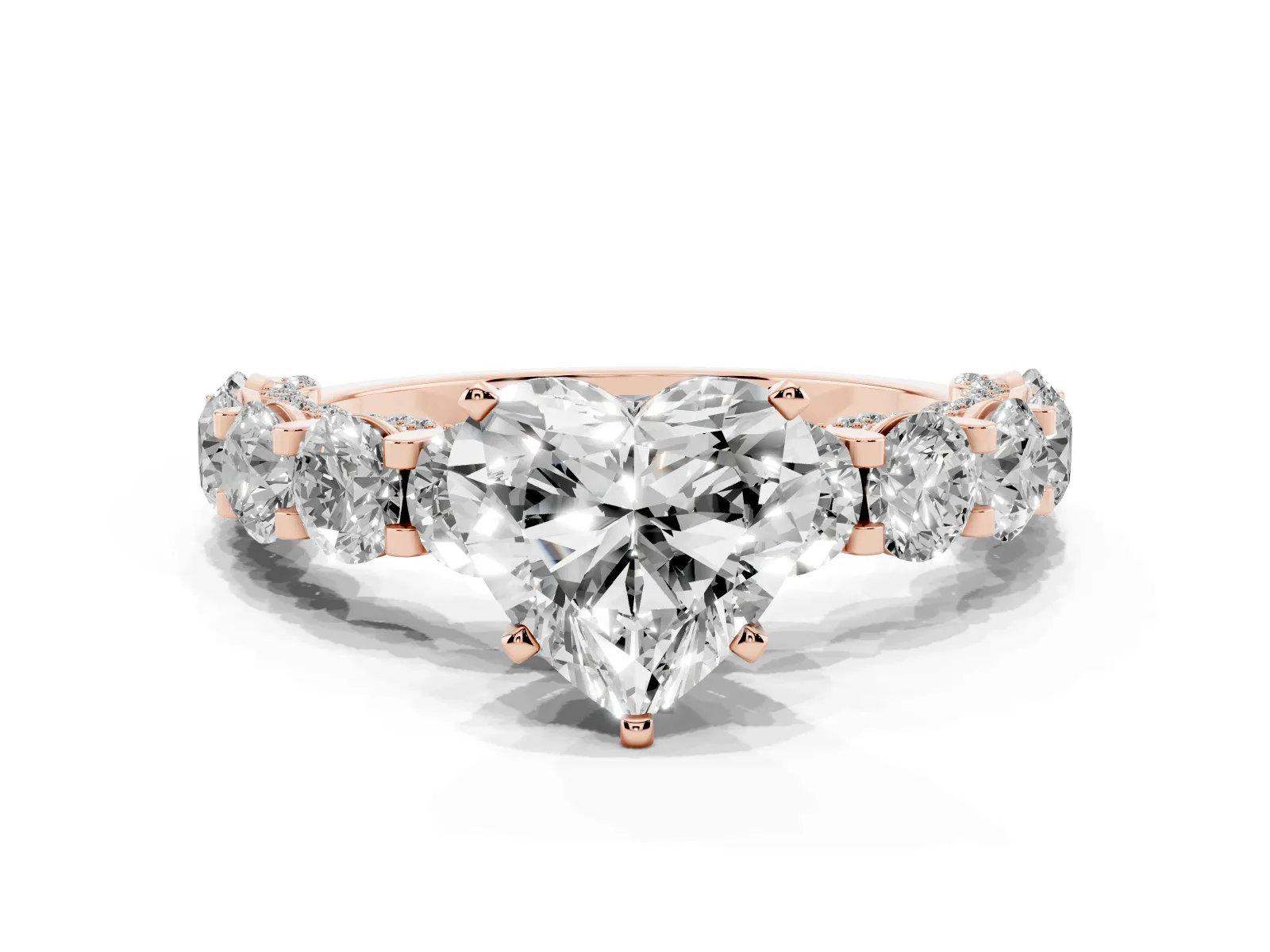 Heart Cut Diamond Side Stone Engagement Ring with Four-Prong Setting Rose gold