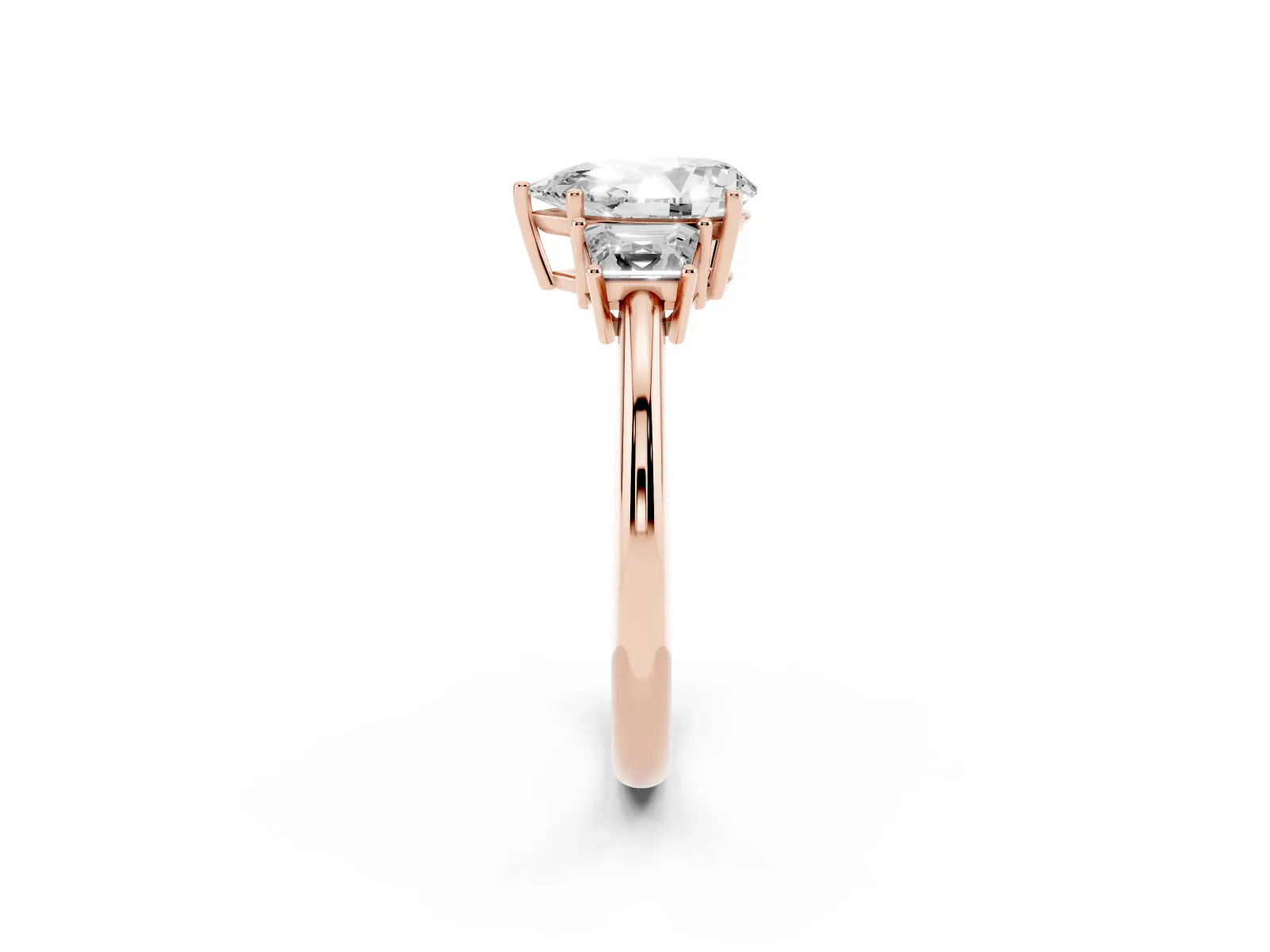 Pear Cut Diamond Three-Stone Ring with Trapezoid Side Stones and Prong Setting Rose gold