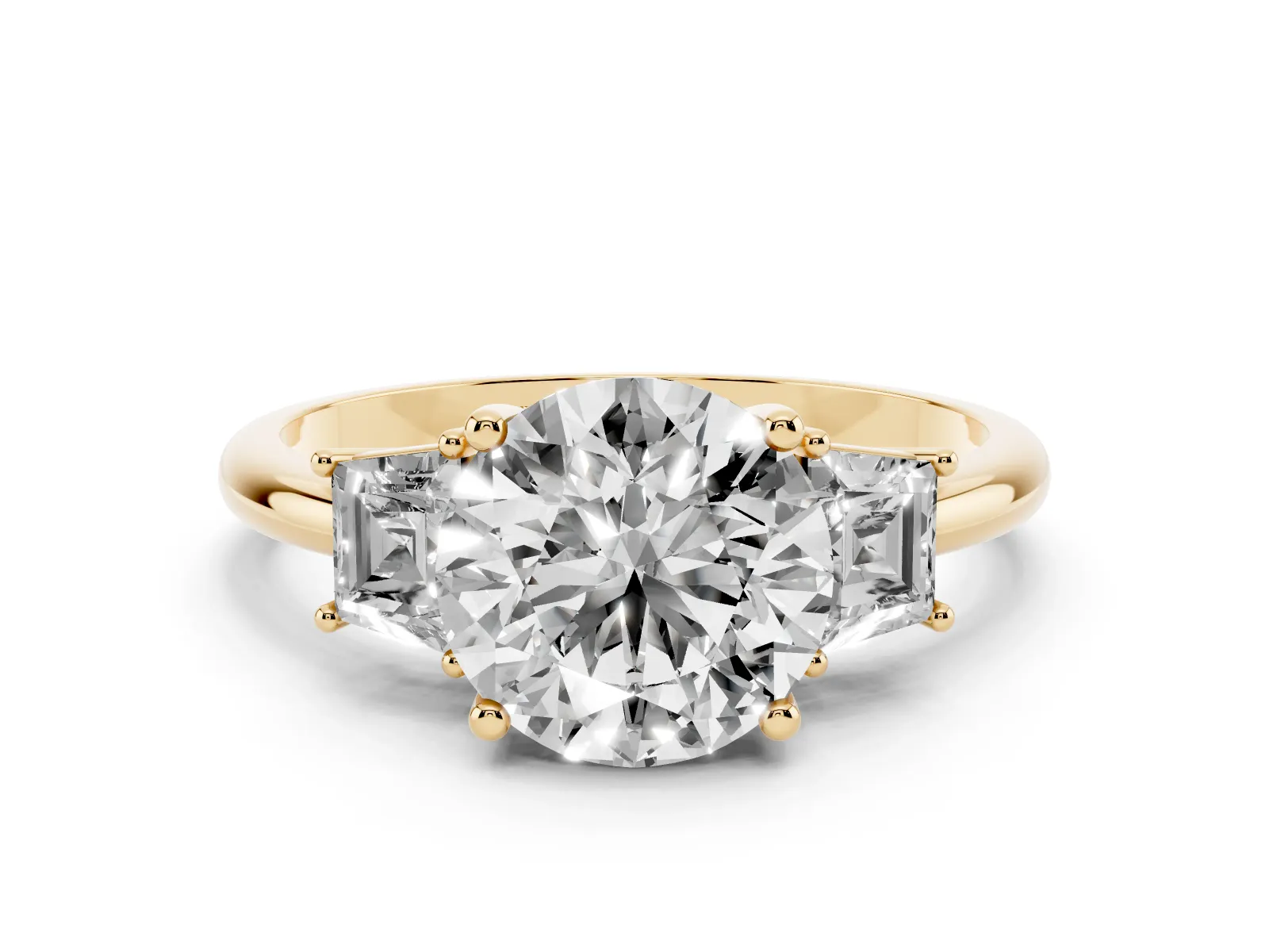 Round Cut Diamond Three-Stone Ring with Trapezoid Side Stones and Prong Setting Yellow gold