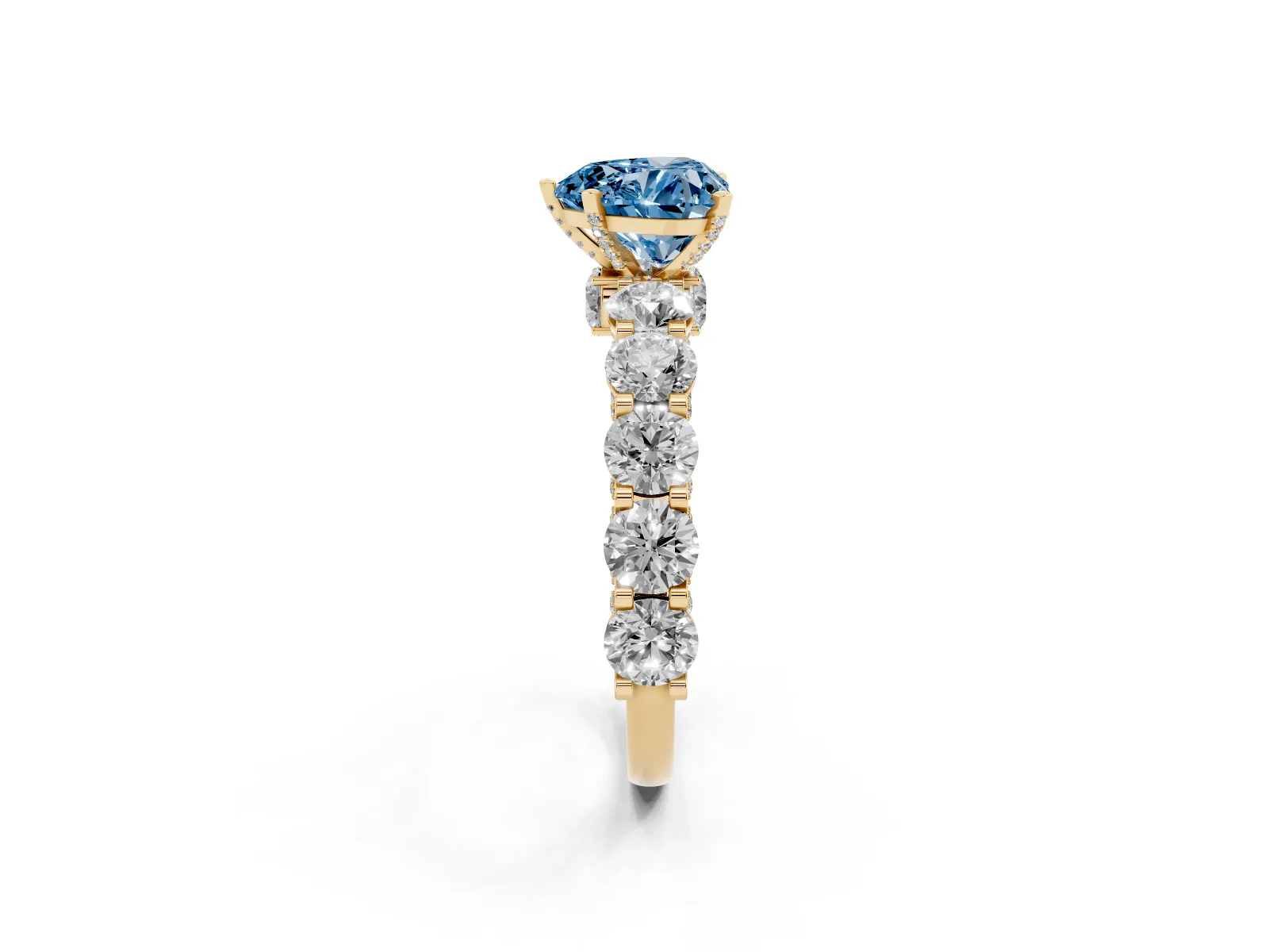Fancy Blue Heart Cut Diamond Side Stone Engagement Ring with Four-Prong Setting Yellow gold