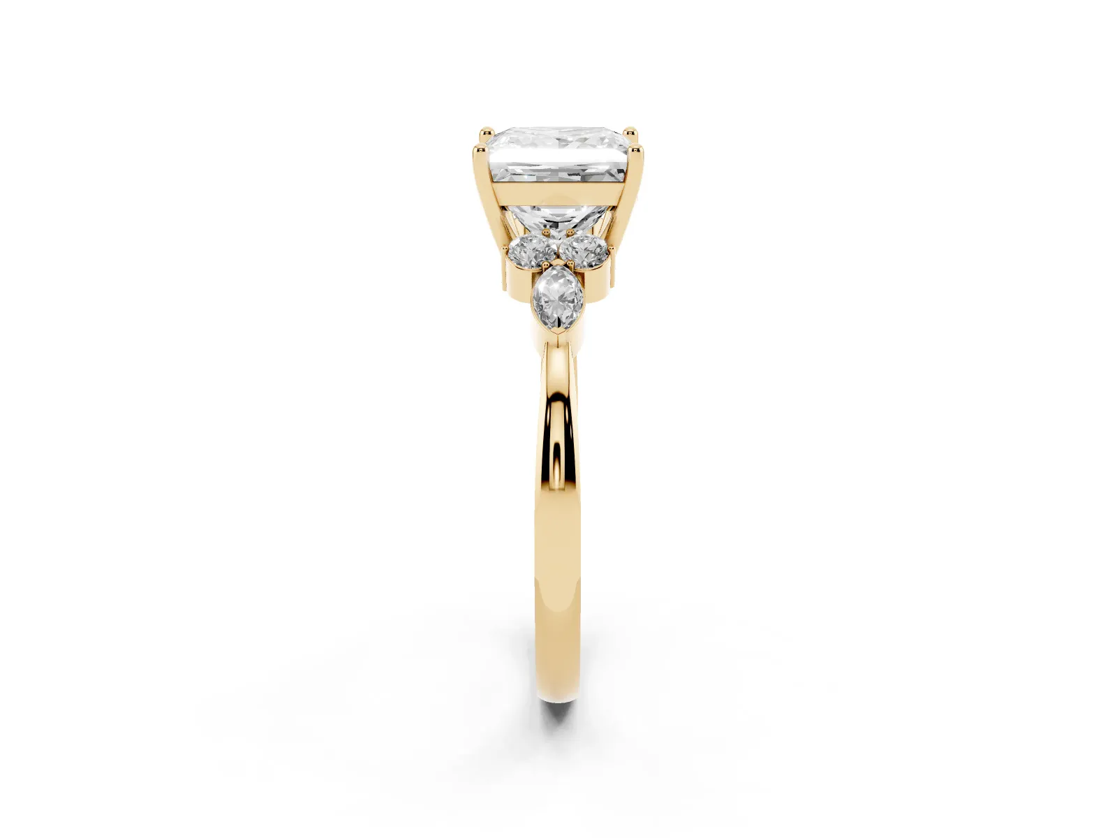 Princess Cut Brilliant Diamond Solitaire Ring with Pear Side Stones and Four-Prong Setting Yellow gold