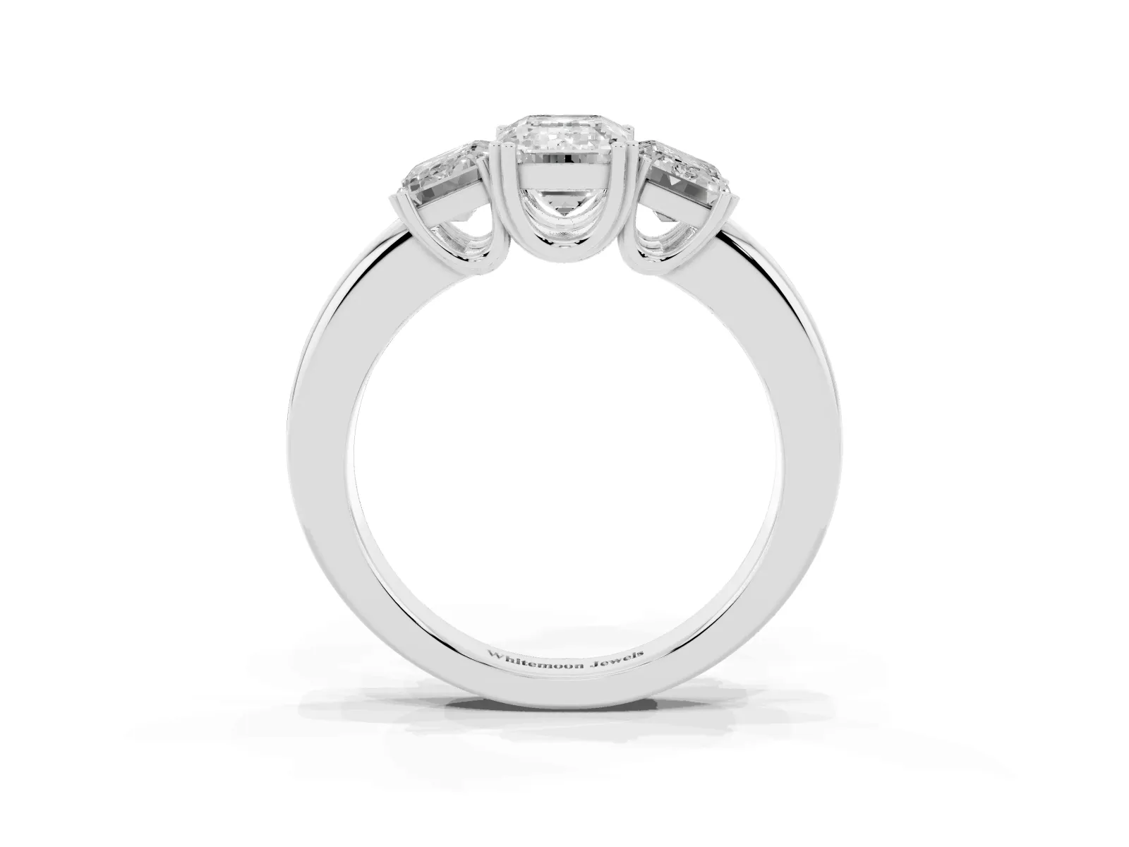 Three-Stone Emerald Cut Cut Diamond Ring with Channel Set Band and Four-Prong Setting White gold