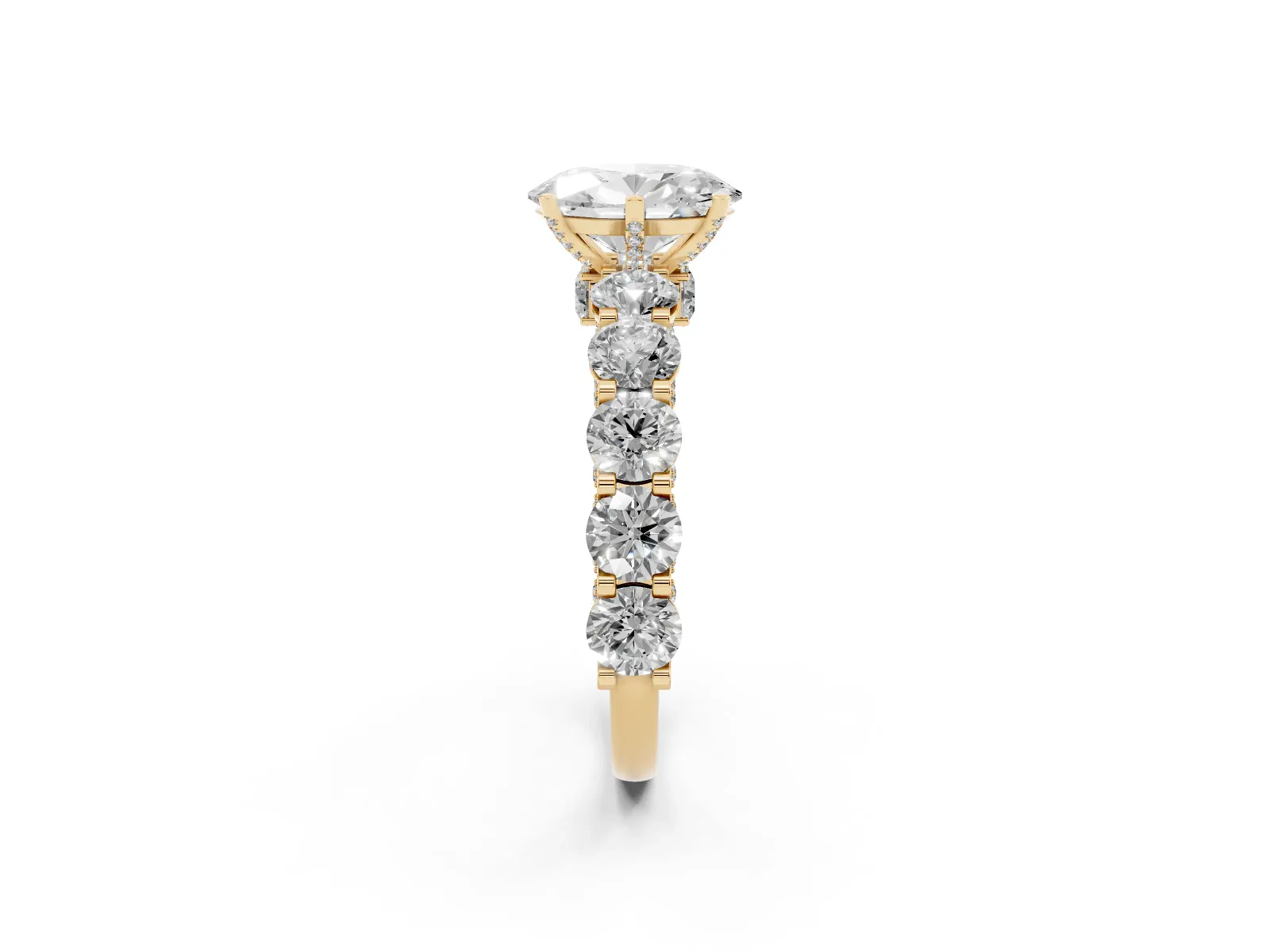 Oval Cut Diamond Side Stone Engagement Ring with Four-Prong Setting Yellow gold