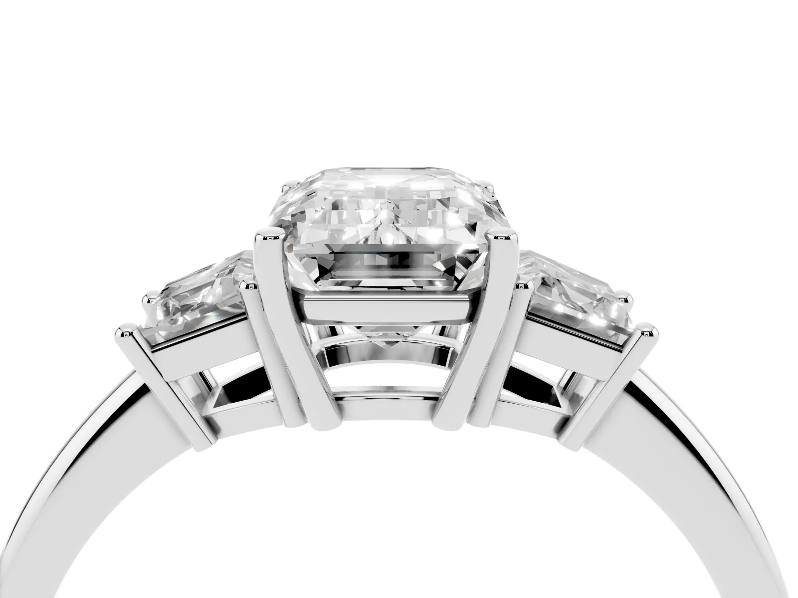 Emerald Cut Diamond Three-Stone Ring with Trapezoid Side Stones and Prong Setting Platinum