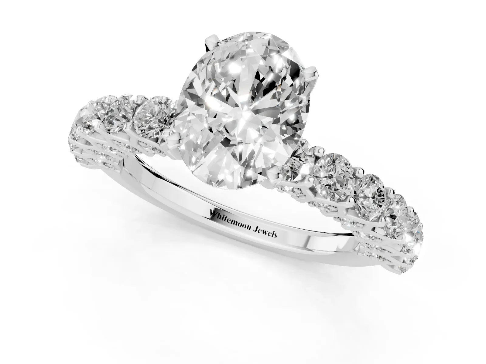 Oval Cut Diamond Solitaire Ring with Shared Prong Pavé Band and Four-Prong Setting White gold
