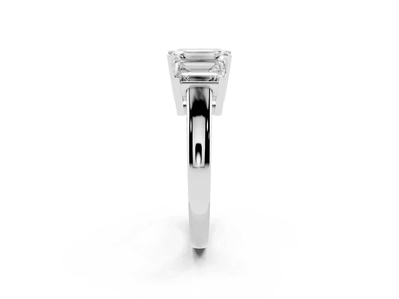 Three-Stone Emerald Cut Cut Diamond Ring with Channel Set Band and Four-Prong Setting Platinum
