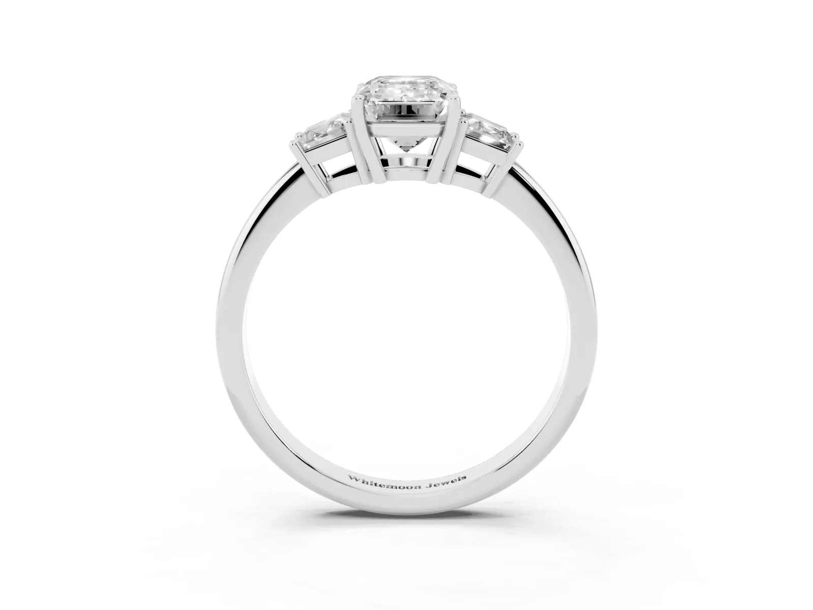 Emerald Cut Diamond Three-Stone Ring with Trapezoid Side Stones and Prong Setting Platinum