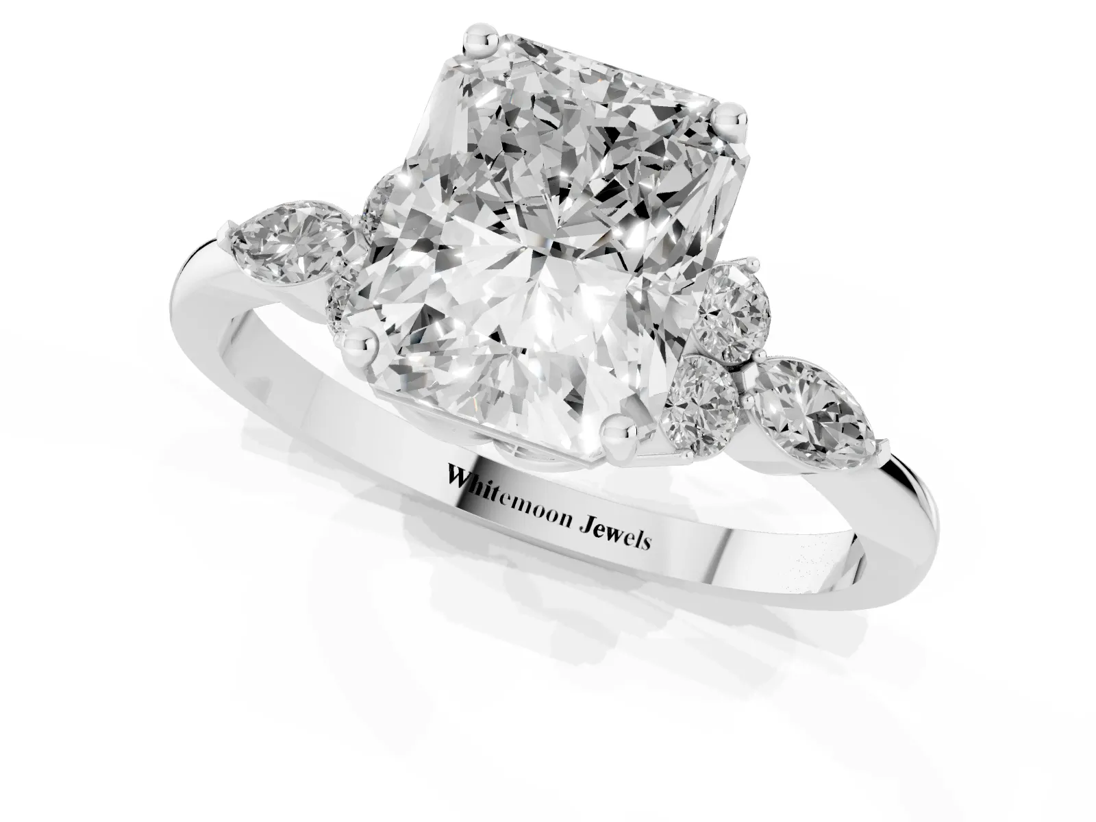 Radiant Cut Brilliant Diamond Solitaire Ring with Pear Side Stones and Four-Prong Setting White gold