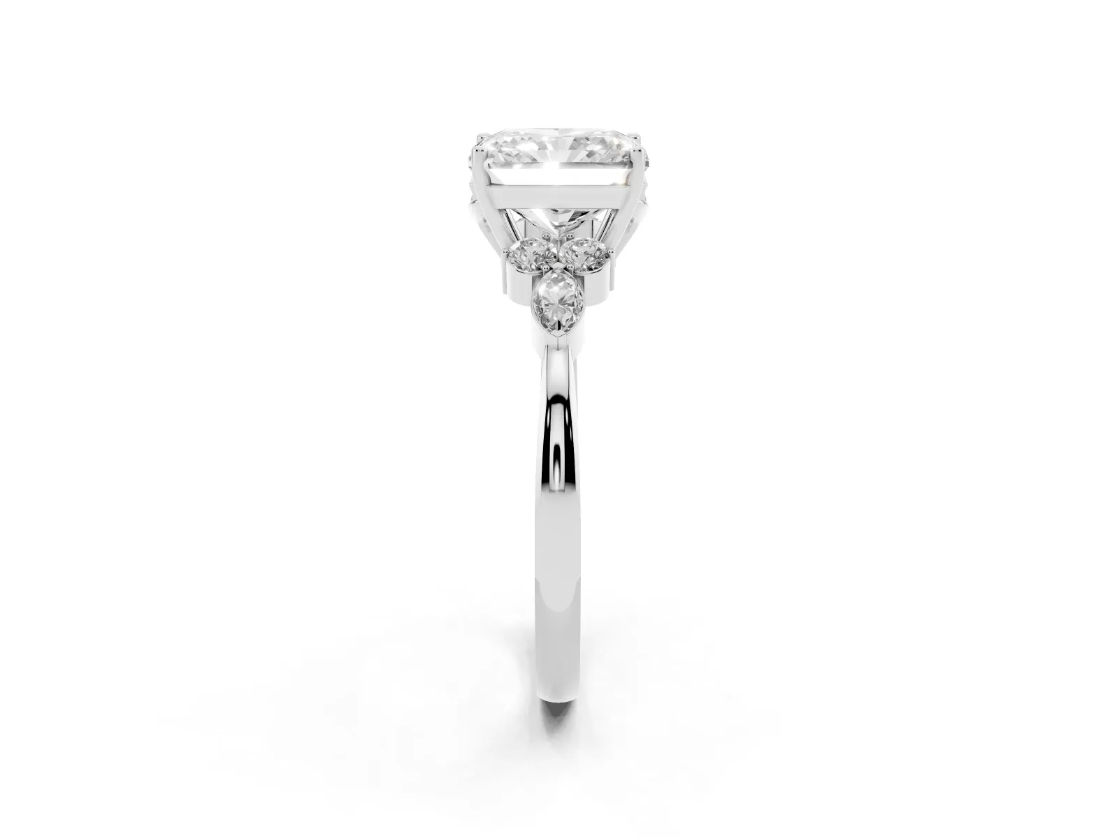 Radiant Cut Brilliant Diamond Solitaire Ring with Pear Side Stones and Four-Prong Setting White gold