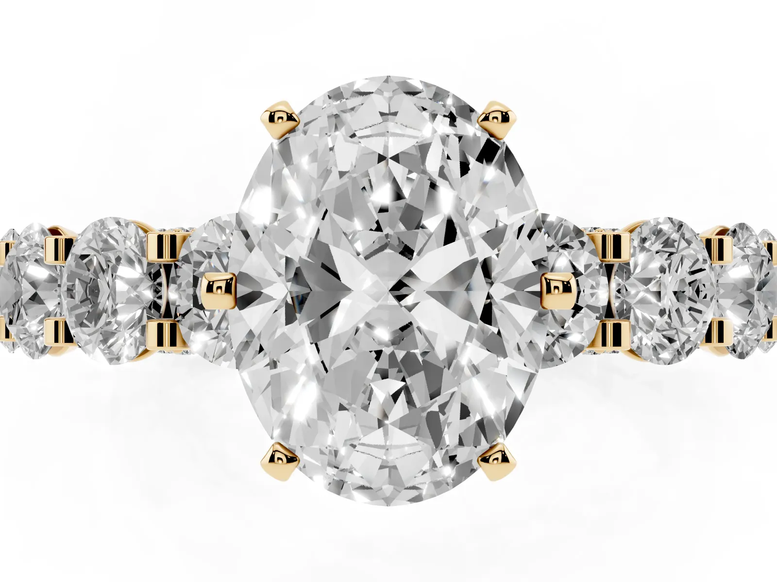 Oval Cut Diamond Side Stone Engagement Ring with Four-Prong Setting Yellow gold