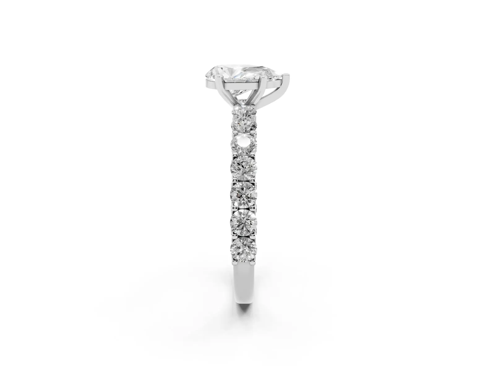 Pear Cut Diamond Solitaire Ring with Shared Prong Pavé Band and Four-Prong Setting White gold