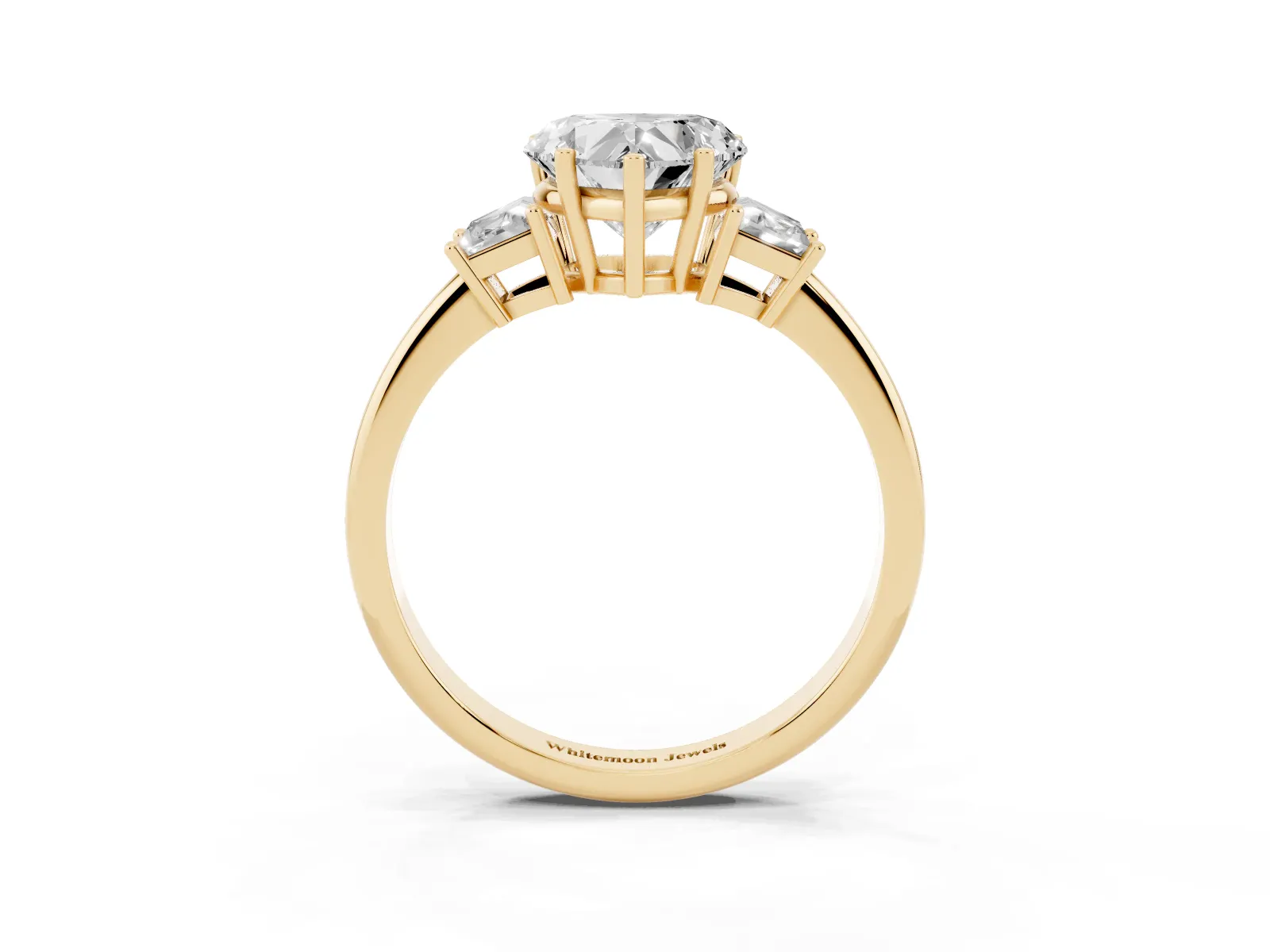 Heart Cut Diamond Three-Stone Ring with Trapezoid Side Stones and Prong Setting Yellow gold