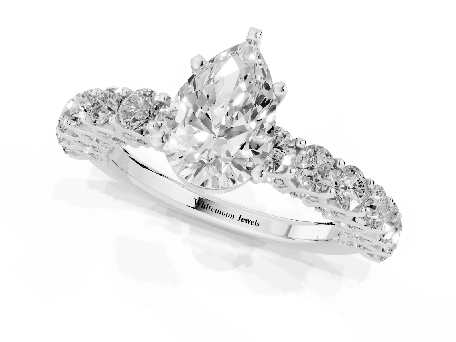 Pear Cut Diamond Solitaire Ring with Shared Prong Pavé Band and Four-Prong Setting White gold