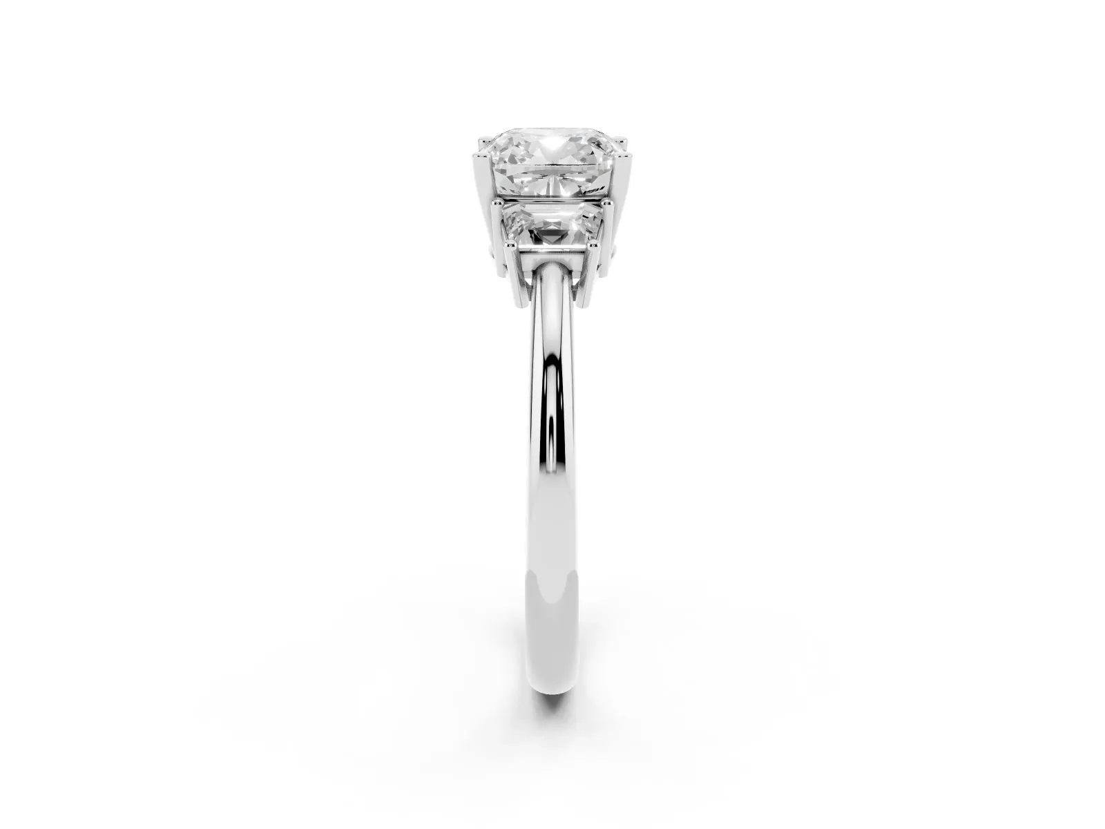 Cushion Cut Diamond Three-Stone Ring with Trapezoid Side Stones and Prong Setting Platinum