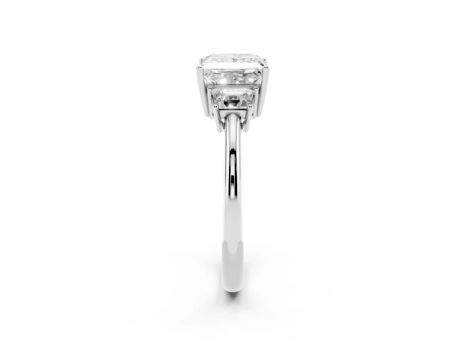 Princess Cut Diamond Three-Stone Ring with Trapezoid Side Stones and Prong Setting Silver