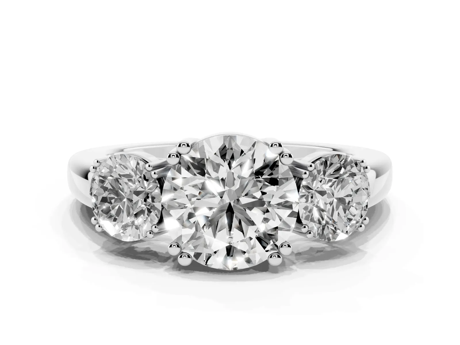 Three-Stone Round Cut Cut Diamond Ring with Channel Set Band and Four-Prong Setting White gold