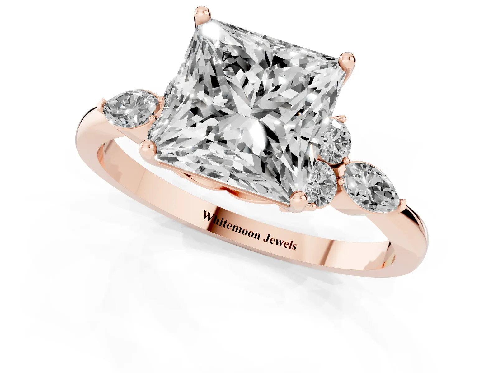 Princess Cut Brilliant Diamond Solitaire Ring with Pear Side Stones and Four-Prong Setting Rose gold