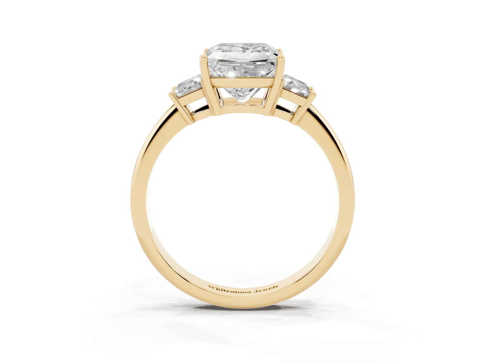 Princess Cut Diamond Three-Stone Ring with Trapezoid Side Stones and Prong Setting Yellow gold