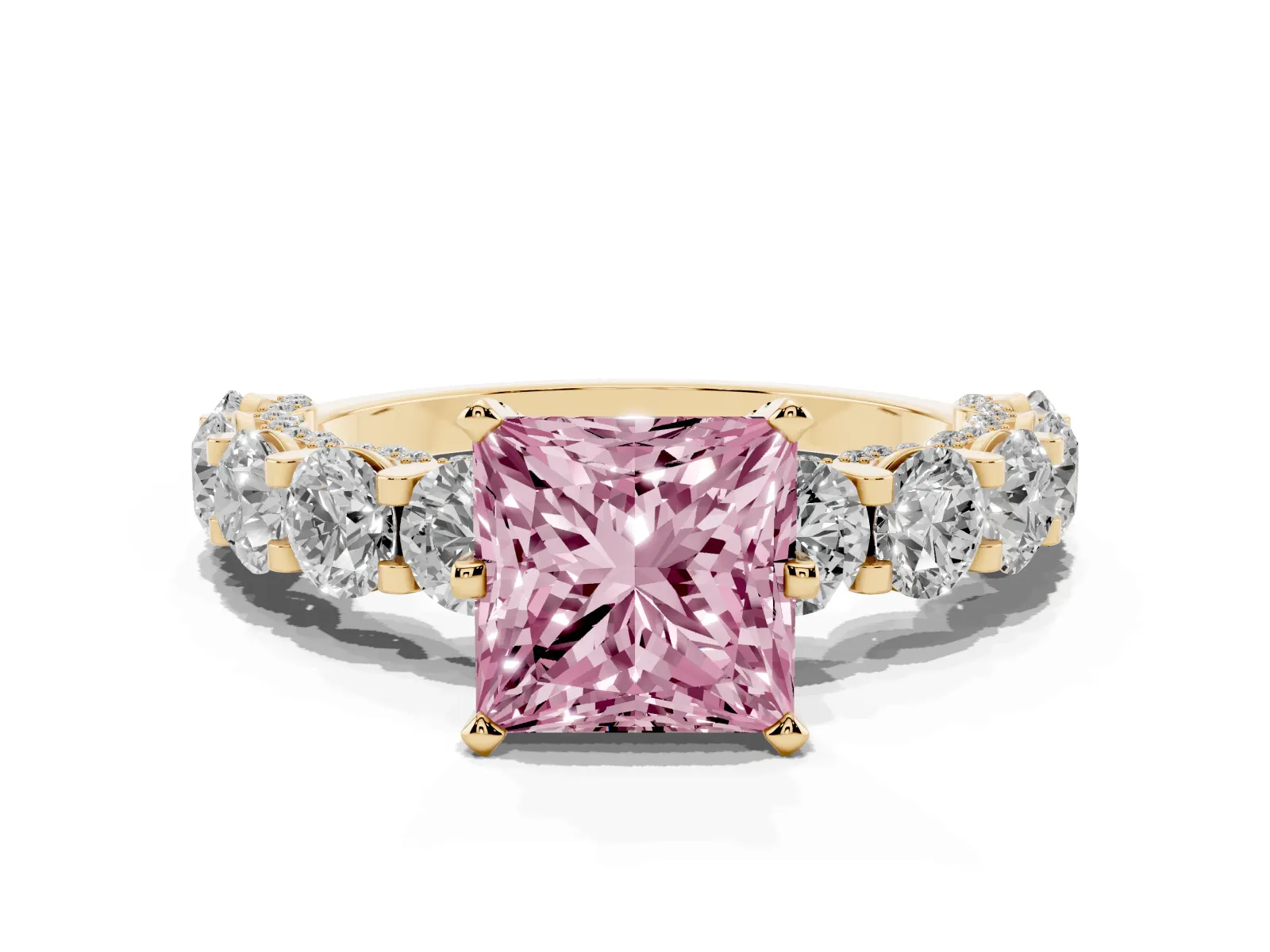 Fancy Pink Princess Cut Diamond Side Stone Engagement Ring with Four-Prong Setting Yellow gold