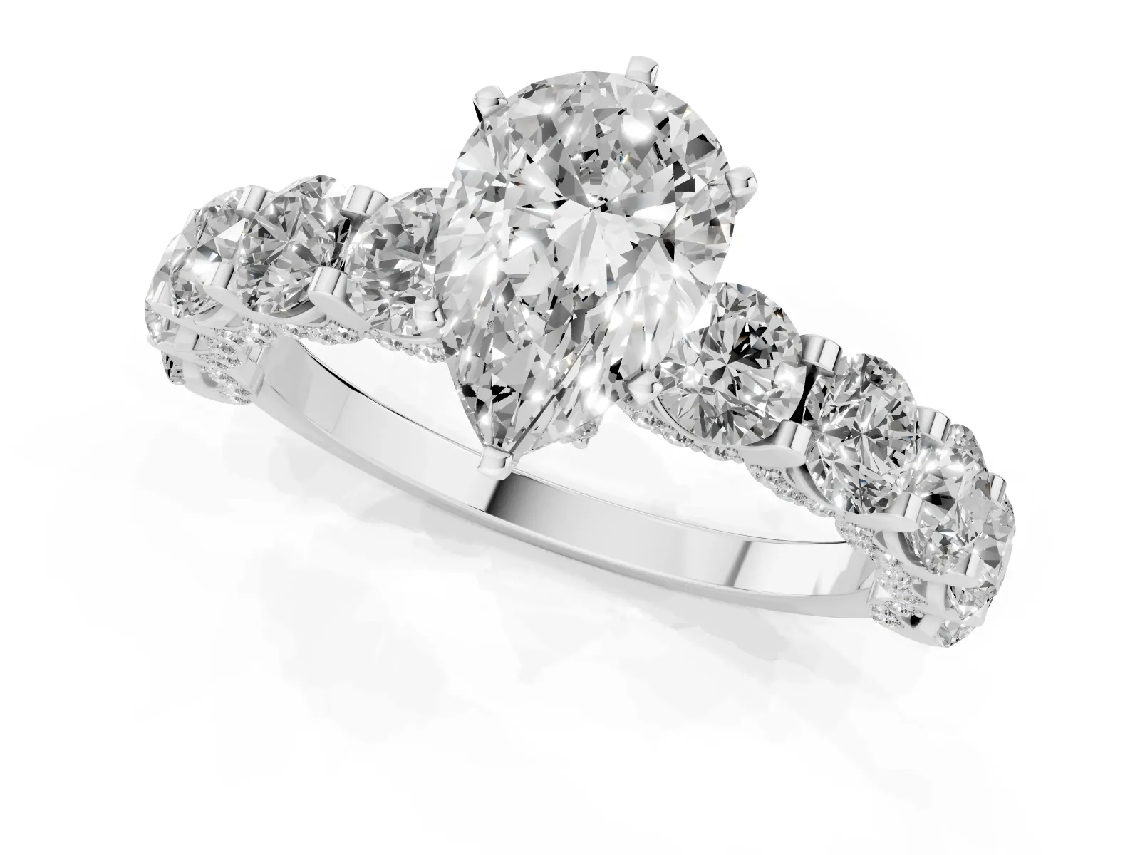 Pear Cut Diamond Side Stone Engagement Ring with Four-Prong Setting Silver