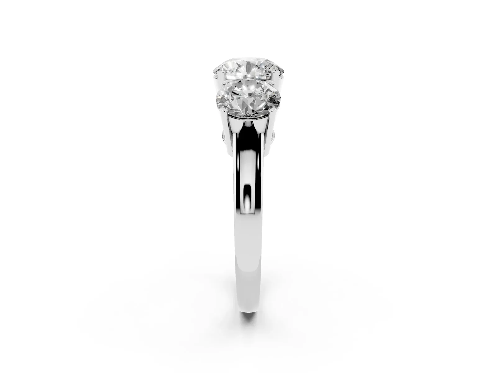 Three-Stone Round Cut Cut Diamond Ring with Channel Set Band and Four-Prong Setting Platinum